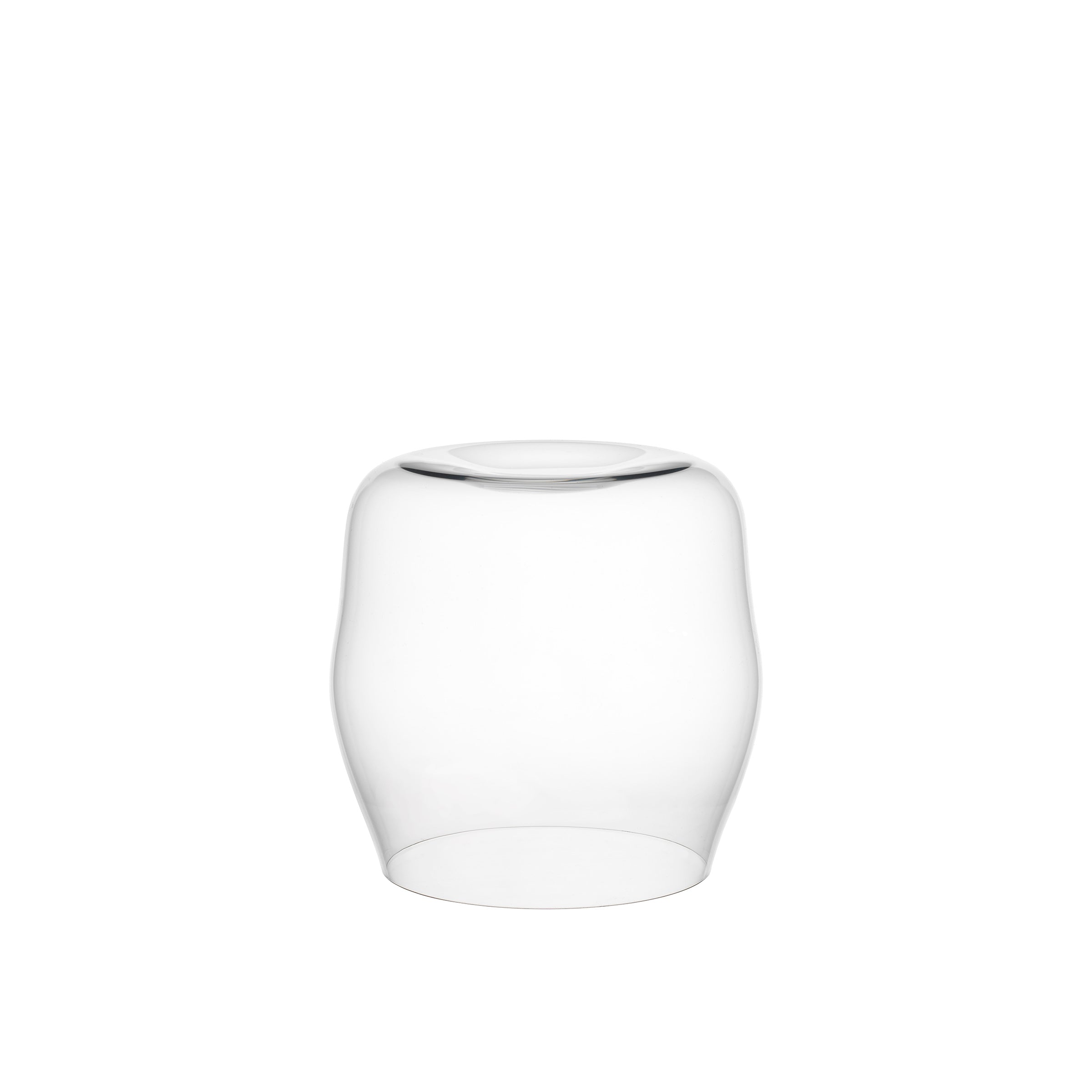 The transparent glass vase has a rounded, slightly tapered design reminiscent of an Aldo Bakker creation. Set against a white background, its smooth surface and subtle shine echo the minimalist elegance of the Lobmeyr Reigen Tumbler.