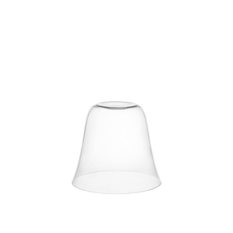 A transparent, dome-shaped Reigen Tumbler by Lobmeyr is inverted on a plain white background, featuring smooth curved sides and a wider base that gently tapers towards the top, reminiscent of Aldo Bakker design.