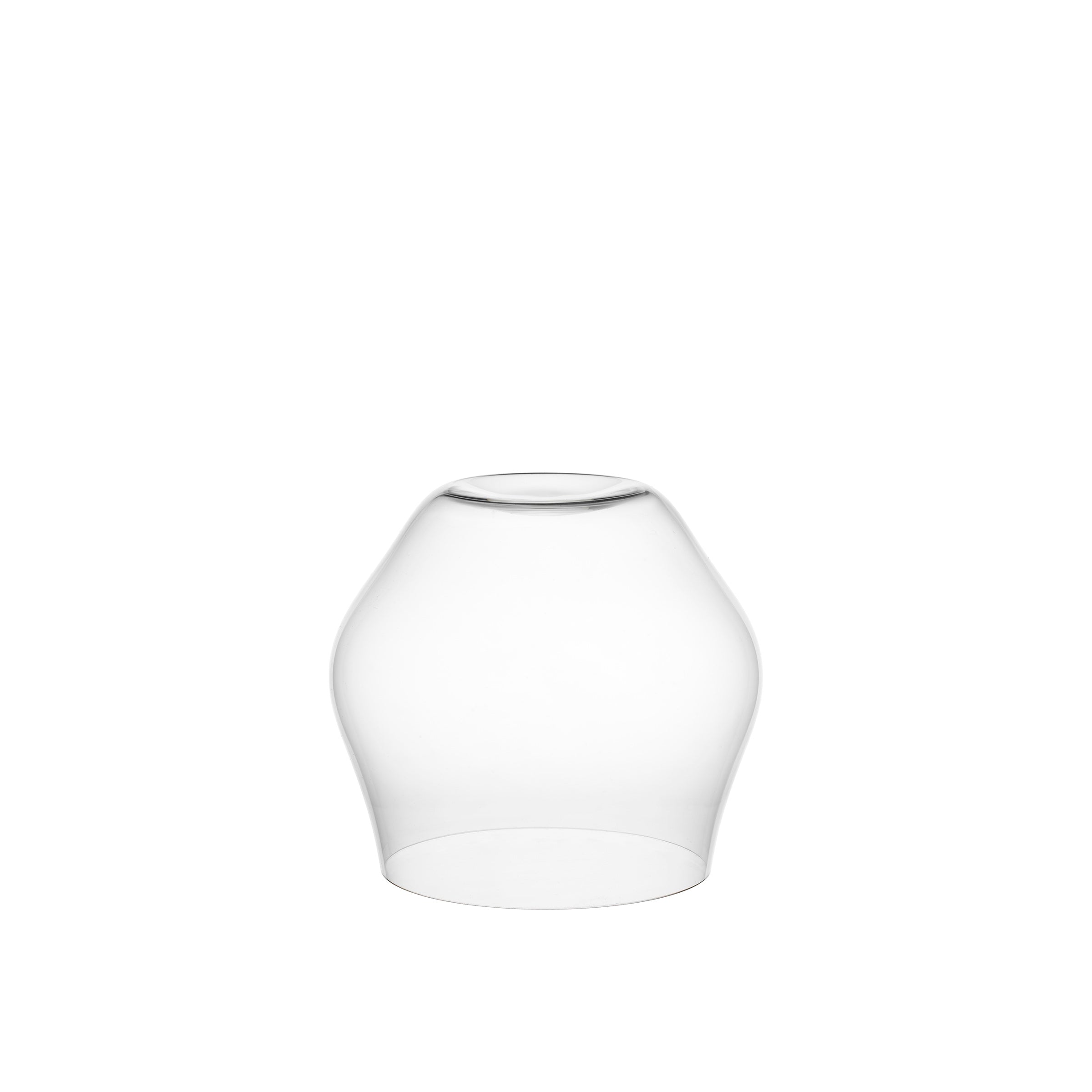 The Reigen Tumbler by Lobmeyr features a clear glass lampshade with a smooth, slightly curved conical shape open at the bottom, echoing Aldo Bakkers design, and sits elegantly against a plain white background.