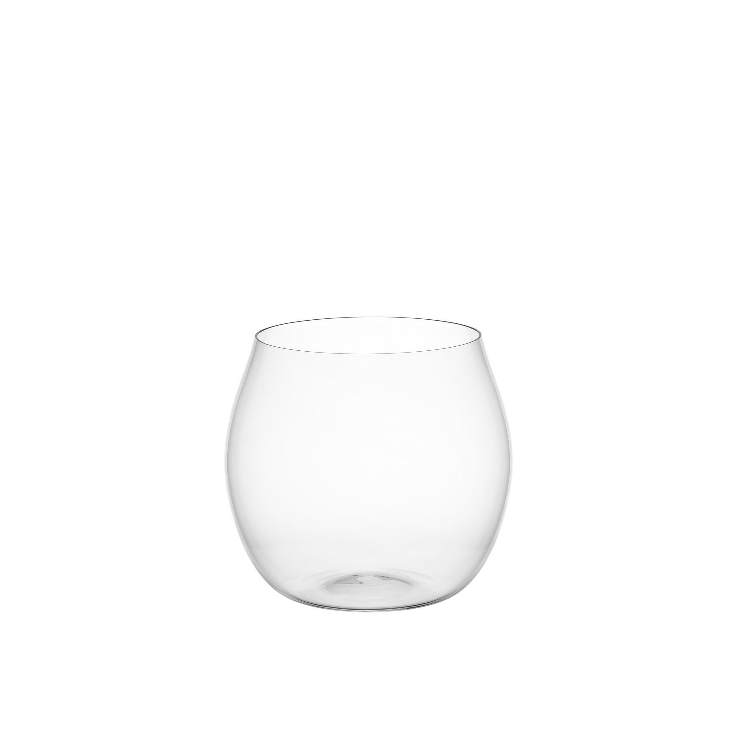 A Reigen Tumbler by Lobmeyr, clear and stemless with a slightly curved design, stands upright against a simple white background, echoing Aldo Bakkers elegant style.