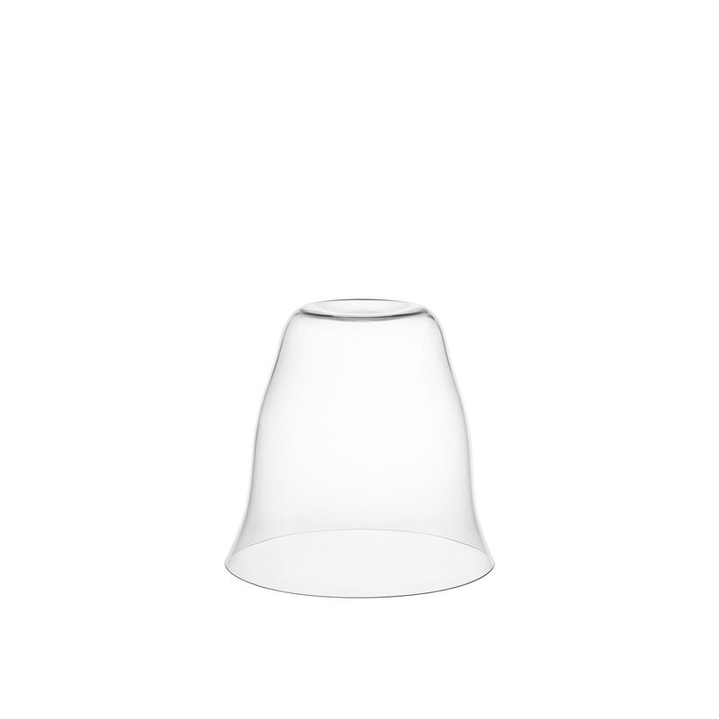 The Reigen Tumbler by Lobmeyr, reminiscent of Aldo Bakkers design ethos, stands upside down as a transparent glass dome against a plain white background.