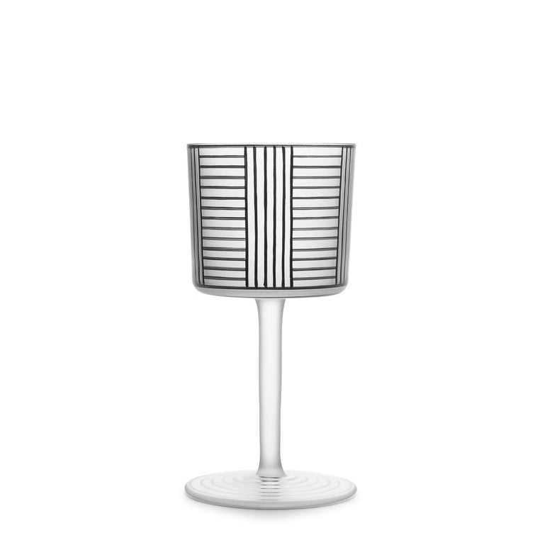 The Drinking Set Serie B wine glass by Lobmeyr features a tall, sleek stem and a cup adorned with vertical and horizontal black stripes in a grid pattern. Expertly crafted from mouth-blown glass inspired by Josef Hoffmann, it rests on a circular base against a plain white background.