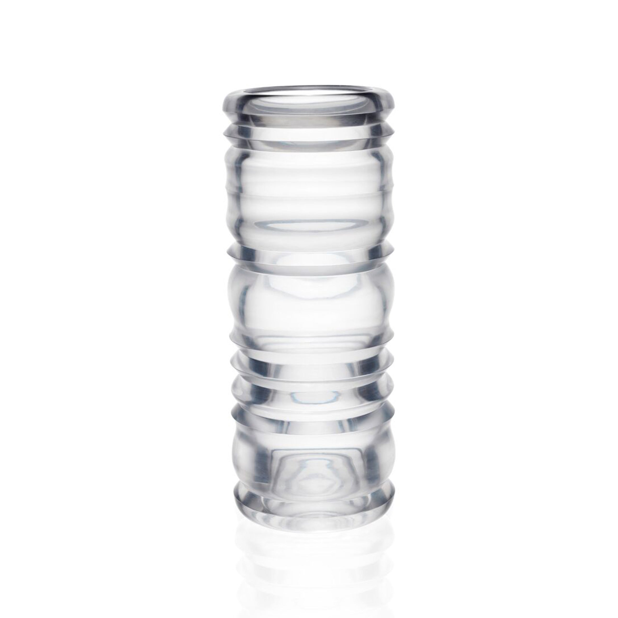 The Thom Series by Lobmeyr features a transparent cylindrical glass vase designed by Sebastian Menschhorn. Crafted from mouth-blown glass, it has a ribbed texture with evenly spaced horizontal grooves for a bamboo-like appearance, elegantly set against a plain white background.