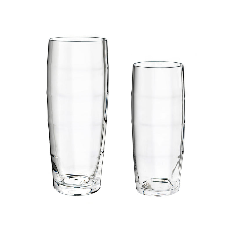 Two Wiener Stutzen tumblers by Lobmeyr, made of mouth-blown lead-free crystal, stand against a white backdrop. The taller one is on the left, while the shorter optic beer tumbler is on the right. Both embody a sleek and minimalistic design.