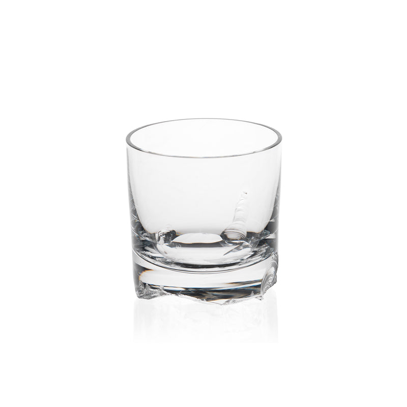 The Bar Series - Flint tumbler by Lobmeyr features a clear, short design and thick base, elegantly reflecting the timeless aesthetic characteristic of Michael Anastassiades work against a plain white background.