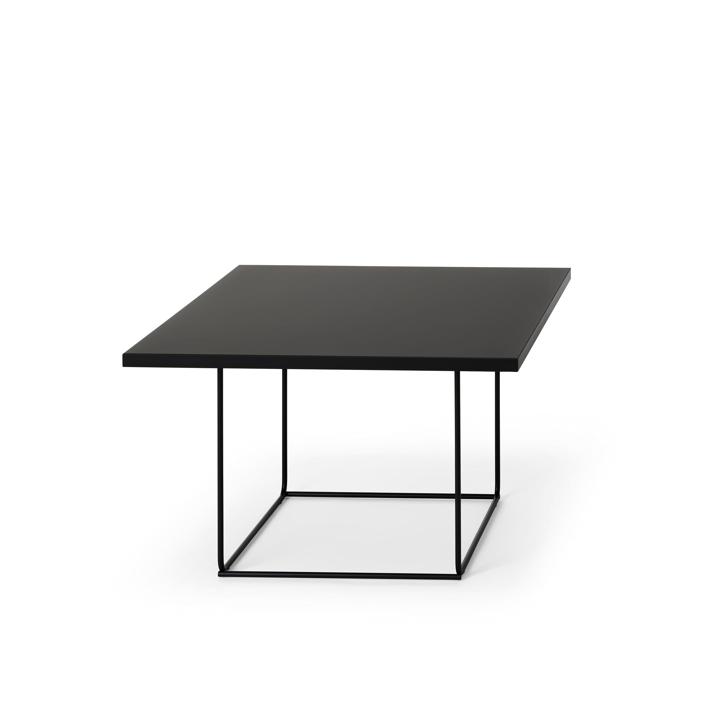 The DL3 Umbra Table Square by Loehr showcases a minimalist square tabletop with a sleek black finish, supported by TANGRAM metal frame legs, all presented against a crisp white background.