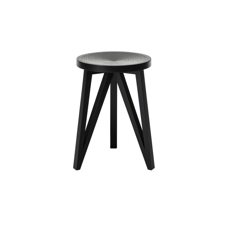 The JL1 Faber Stool by Loehr combines a minimalist northern European design with a black round seat and four geometric, sturdy legs. Made from solid oak, it embodies both style and functionality.