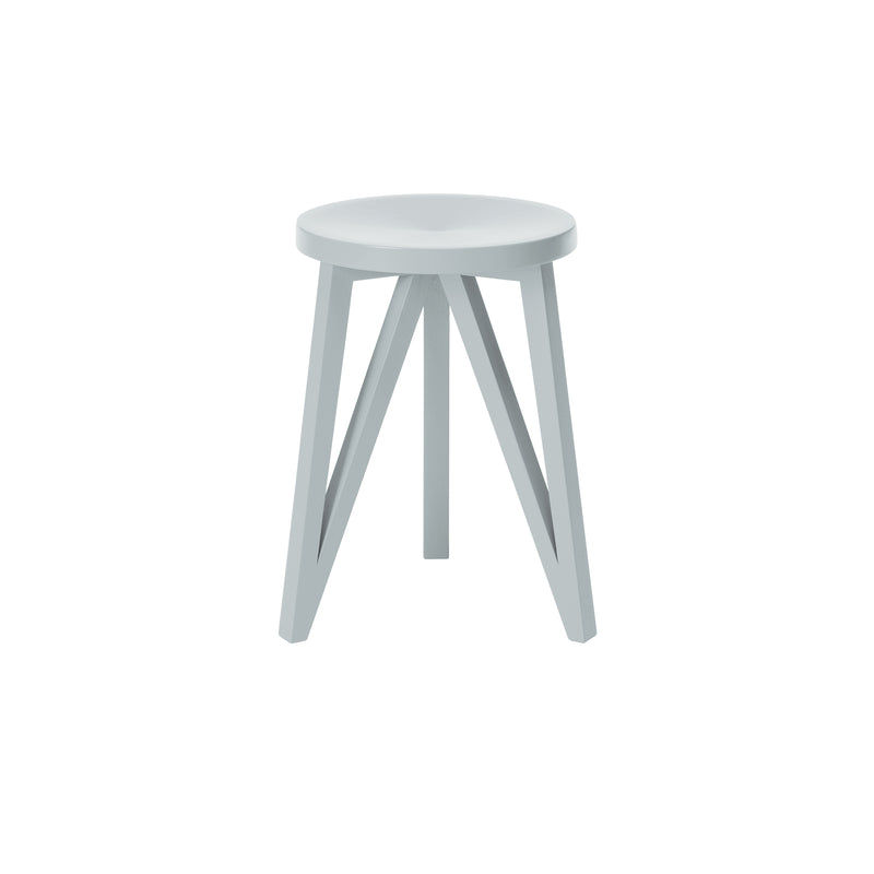 The JL1 Faber Stool by Loehr is a minimalist design with a light gray, round seat and four angled solid oak legs joined by cross supports. Its modern northern European aesthetic is highlighted against a plain white background.