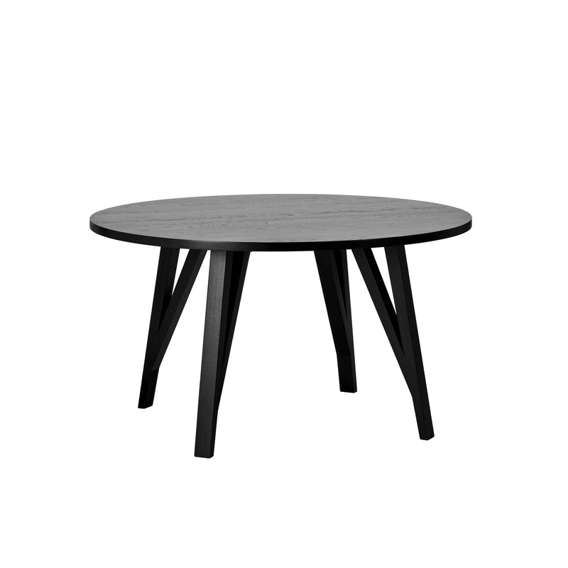 The JL6 Sabeth Table Round by Loehr is a black wooden dining table showcasing impeccable craftsmanship with a solid oak flat surface and four angled legs, epitomizing elegance and functionality.
