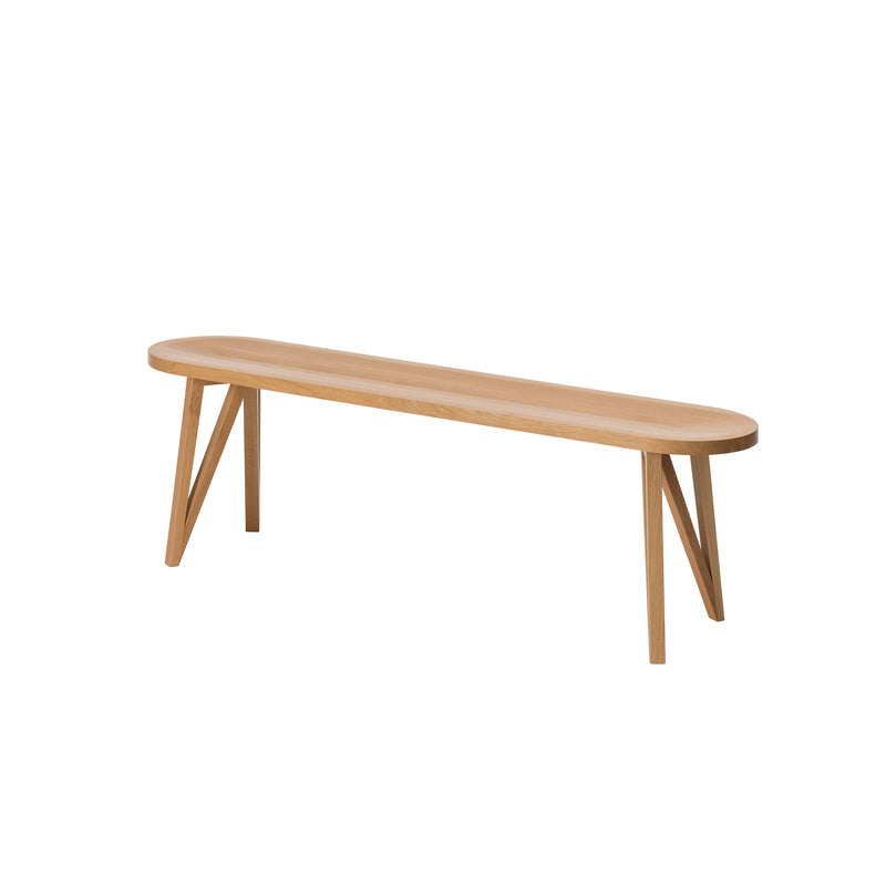 The JL8 Faber Bench by Loehr from the FABER collection is a minimalist piece crafted from solid oak, featuring a smooth rectangular seat and four angled legs, epitomizing northern European design against a plain white background.