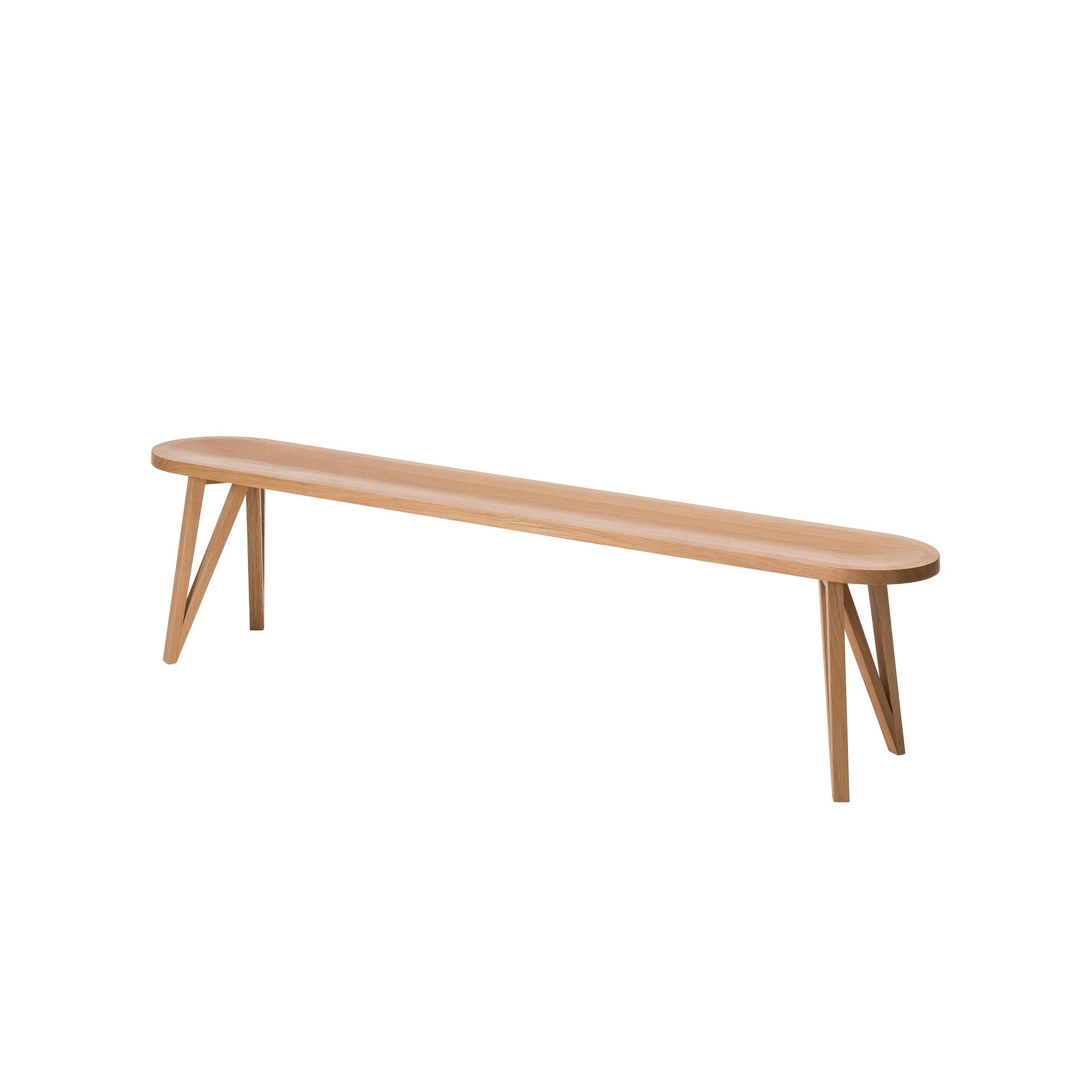 The JL8 Faber Bench by Loehr is a solid oak, minimalist piece with a light wood finish and angled legs, highlighting northern European design against a plain white background.