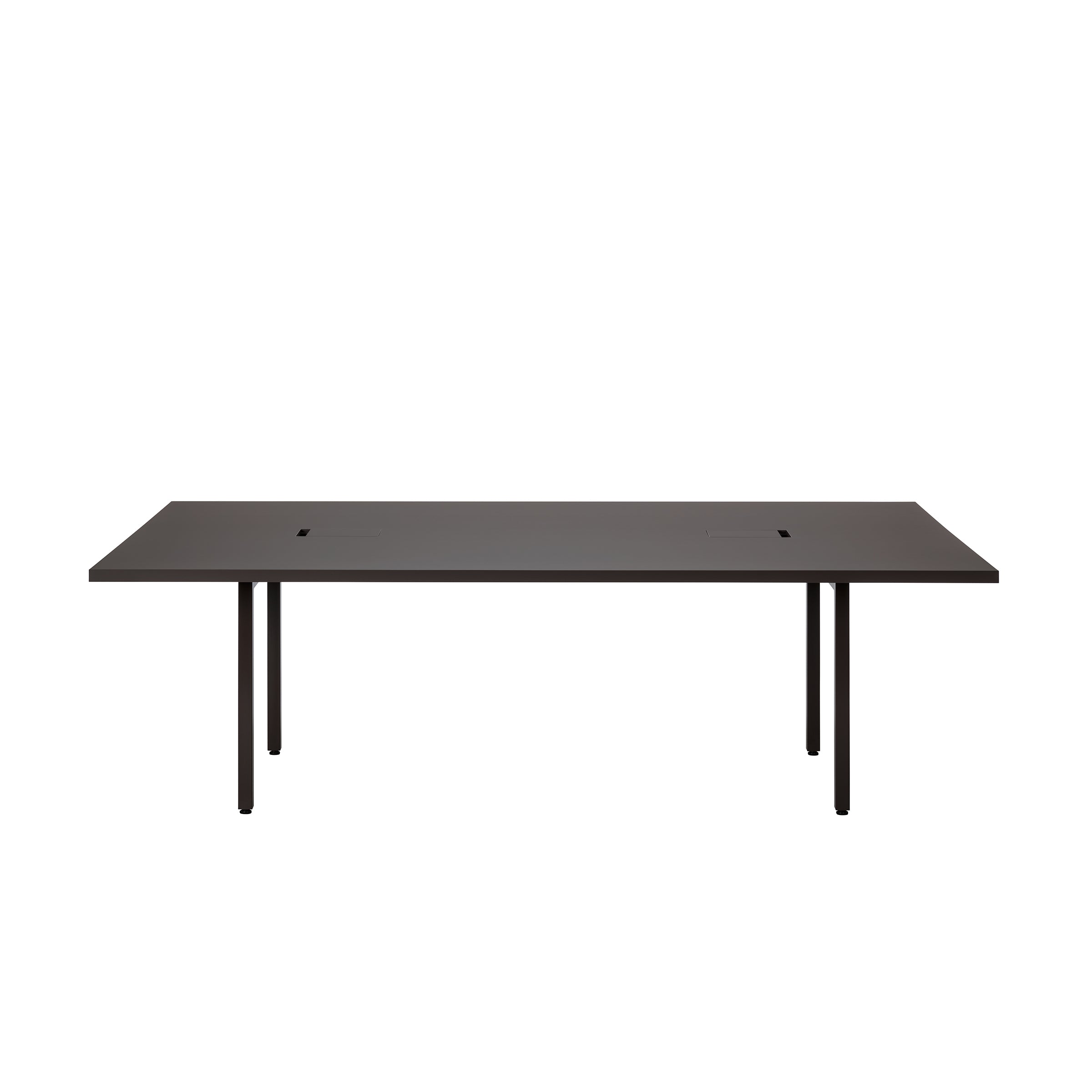 The L2 Eno Worktable by Loehr is a minimalist black table with a rectangular top and slim, straight legs. It features two central slots for cable management, combining functionality and sleek design in a modern hybrid workstation.