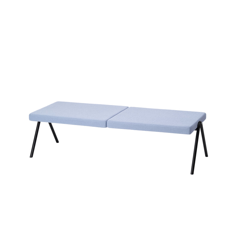 The DL6 Plato Bench by Loehr features two light blue cushioned seats on a luxurious tubular steel frame with outward-angled black metal legs. Its minimalist design seamlessly complements contemporary interiors, showcased on a plain white background.
