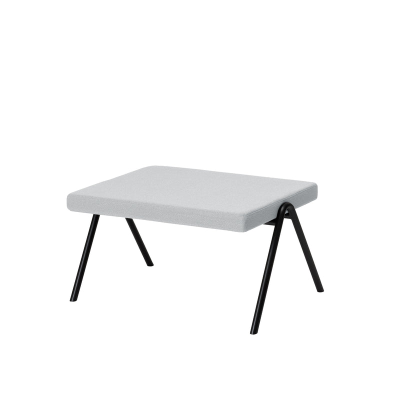 The DL6 Plato Ottoman by Loehr is a modern, minimalist stool with a light gray rectangular seat and four angled legs made of sleek tubular steel. Its clean design and luxurious seating provide a contemporary style, ideal for various interior settings.