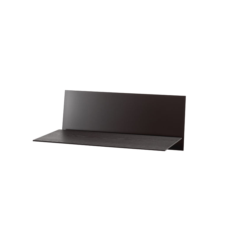 The S1 CHAPTER Bureau by Loehr is a minimalistic black floating wall shelf boasting a sleek, modern design. It features a thin, flat surface with an attached back panel, ideal for contemporary home or office decor against a plain white background.