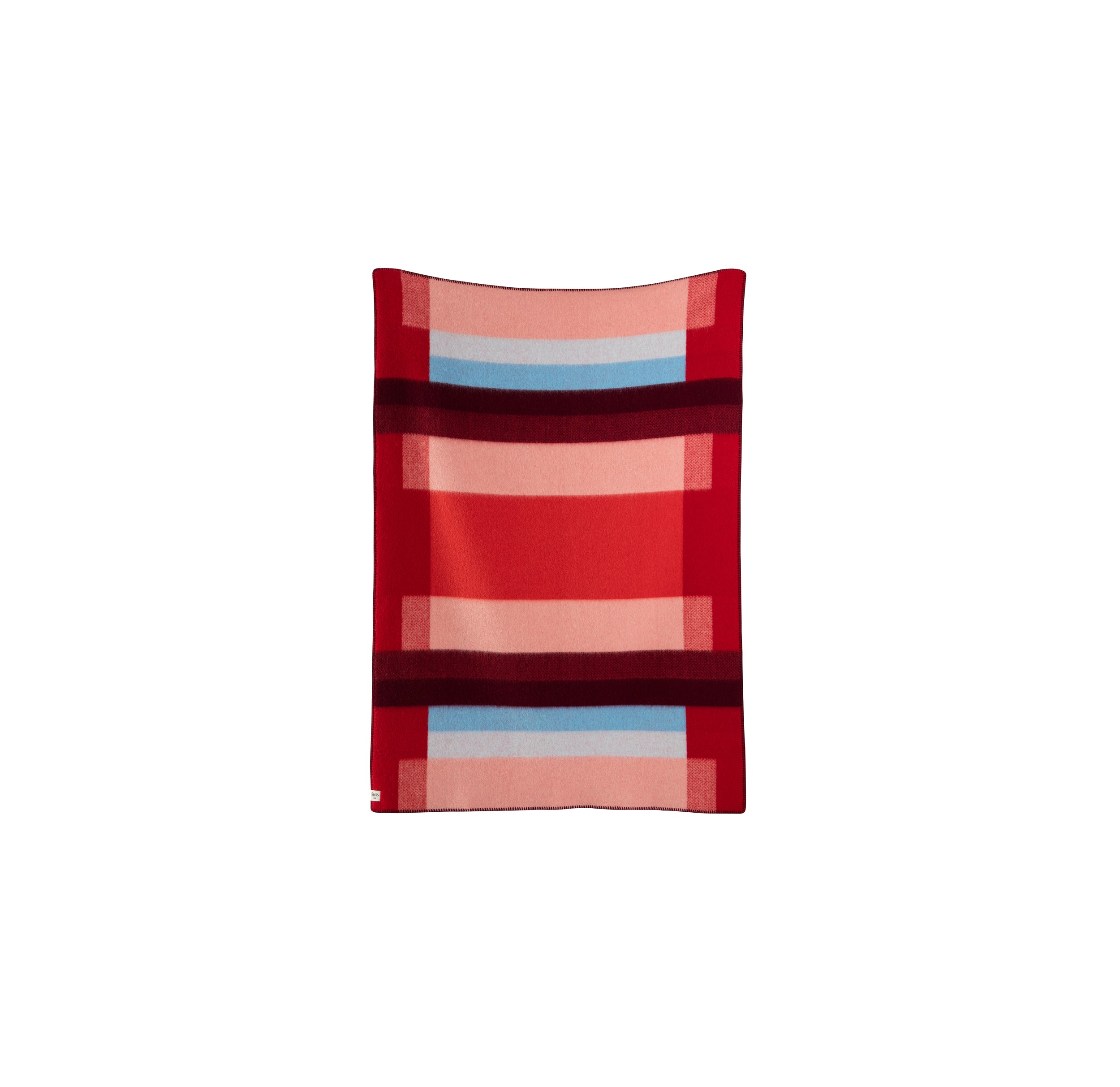 The Mikkel Large Throw by Roros is a rectangular blanket featuring bold horizontal stripes in red, pink, burgundy, and light blue. Made from Norwegian wool, it reflects a Bauhaus-inspired design and is showcased elegantly against a white background.