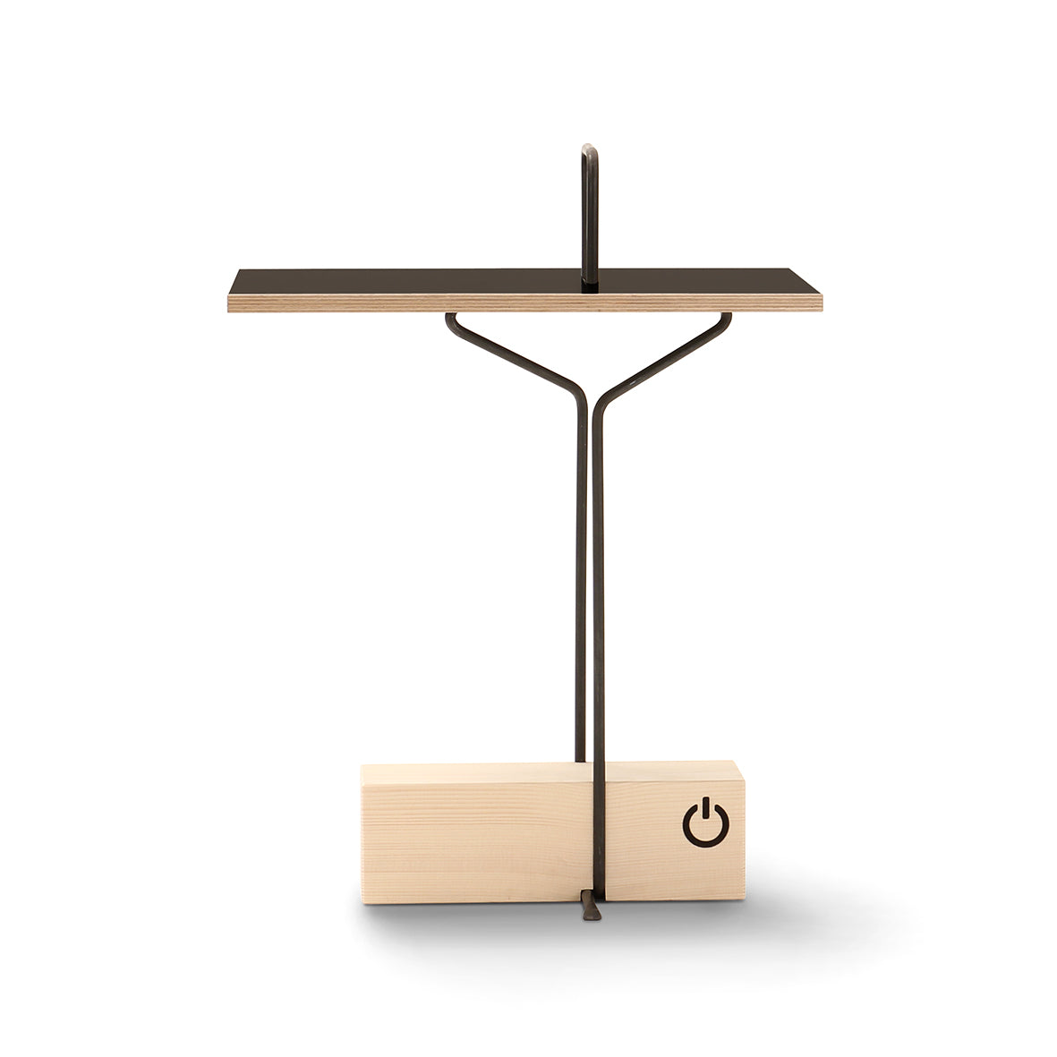The Abgemahnt by Moormann is a minimalist desk lamp featuring a flat rectangular shade, a slender Y-shaped black metal stand, and a wooden base with a power button symbol, perfectly enhancing contemporary tabletop designs.