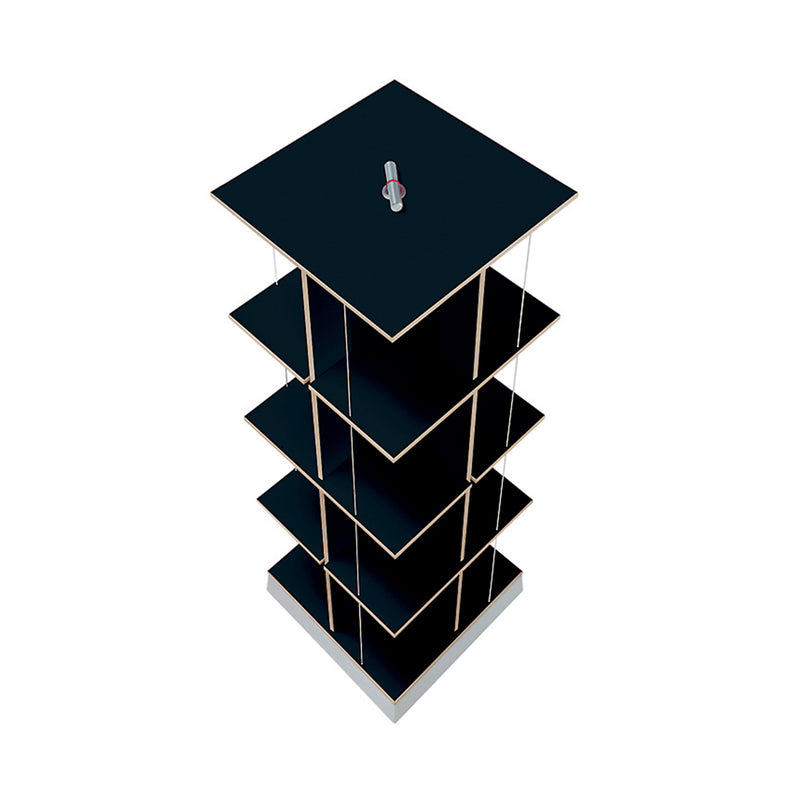 The Buchstabler by Moormann is a six-tiered black rotating display stand with pivotable shelves and a central vertical rod on a light base, providing space-saving storage from any angle.