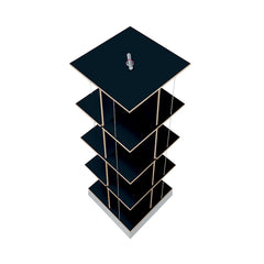 The Buchstabler by Moormann is a six-tiered black rotating display stand with pivotable shelves and a central vertical rod on a light base, providing space-saving storage from any angle.