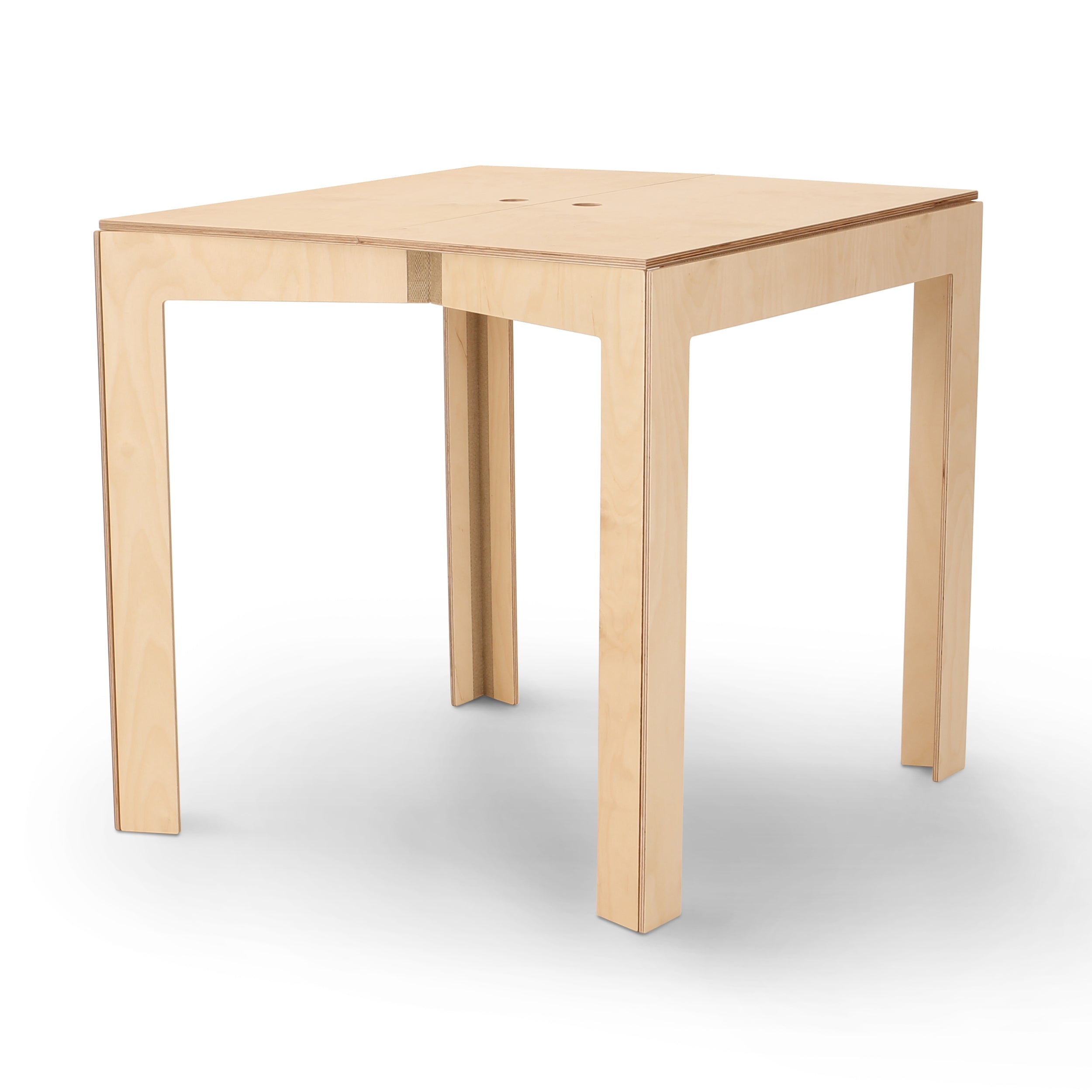 The Moormann Last Minute table, made of birch plywood, boasts a minimalist design with a square top and slightly protruding corners on straight legs. Its light, natural finish offers subtle elegance, ideal for those in search of stylish space-saving furniture.