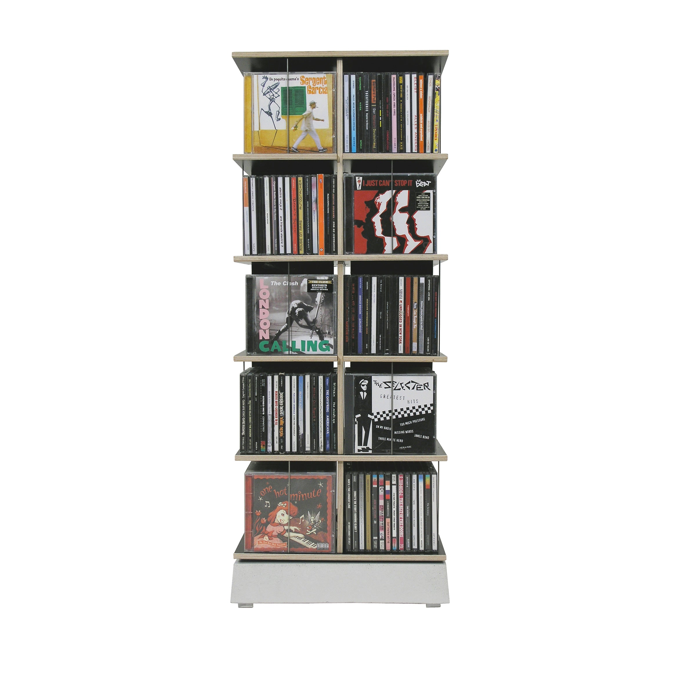 The Moormann Musikstapler is a tall, rotatable CD rack showcasing neatly organized music albums with colorful and black-and-white covers against a white background. This space-saving design perfectly stylishly displays your collection.
