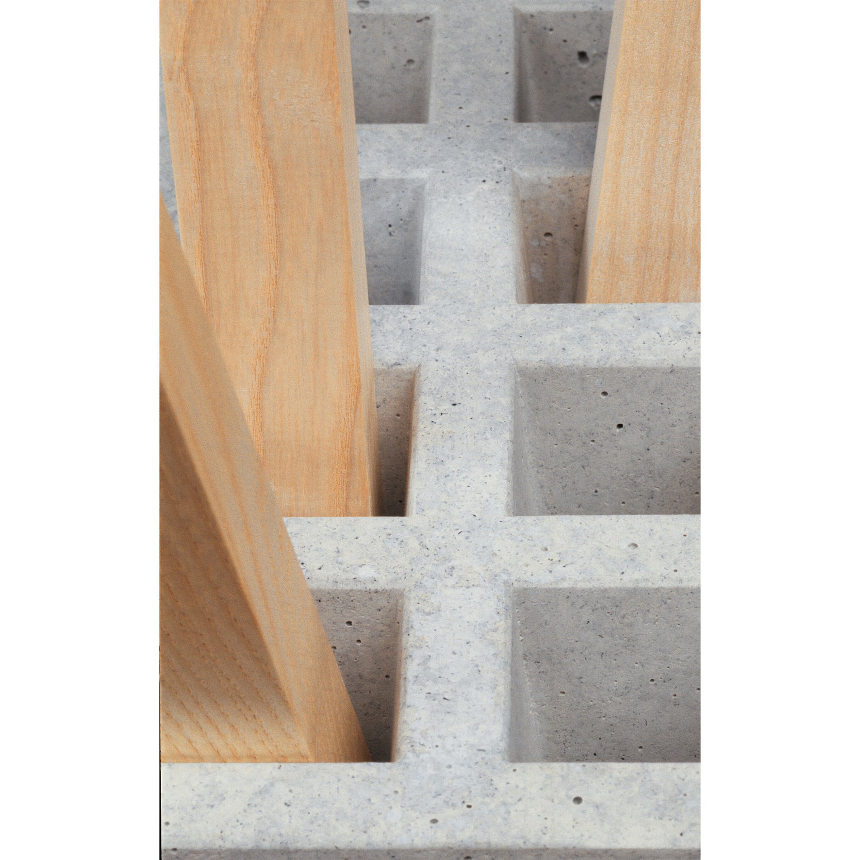 The Pin Coat by Moormann features intersecting concrete and wood elements in a modern design. Its light brown wood contrasts with grey, textured concrete, forming squares and rectangles reminiscent of an adjustable coat rack.