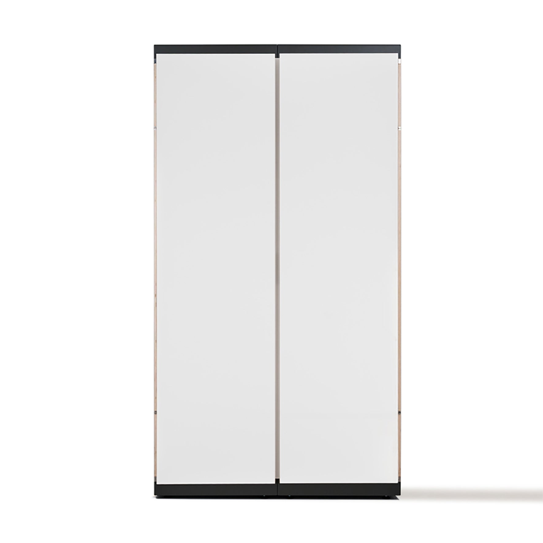 The Schrankone from Moormann is a tall, white, two-door refrigerator featuring a sleek, minimalist design. With narrow black handles meeting at the center and slim black borders on top and bottom, it boasts a modular system for easy organization.
