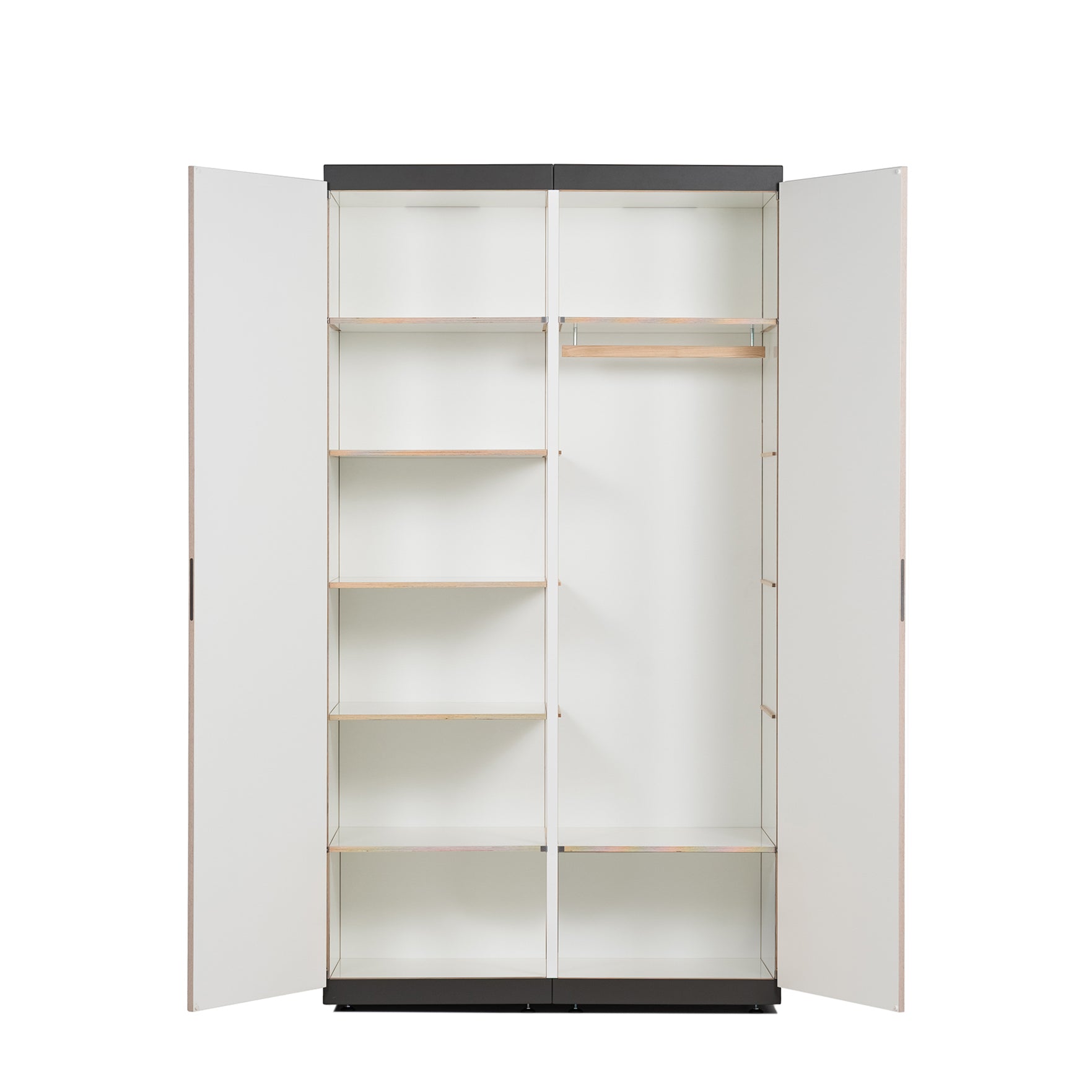 Open the white Schrankone wardrobe by Moormann, designed with two doors and a modular system. It features left-side shelves and a right-side hanging rod with an upper shelf for smart storage, while dark trim accents its minimalist elegance.