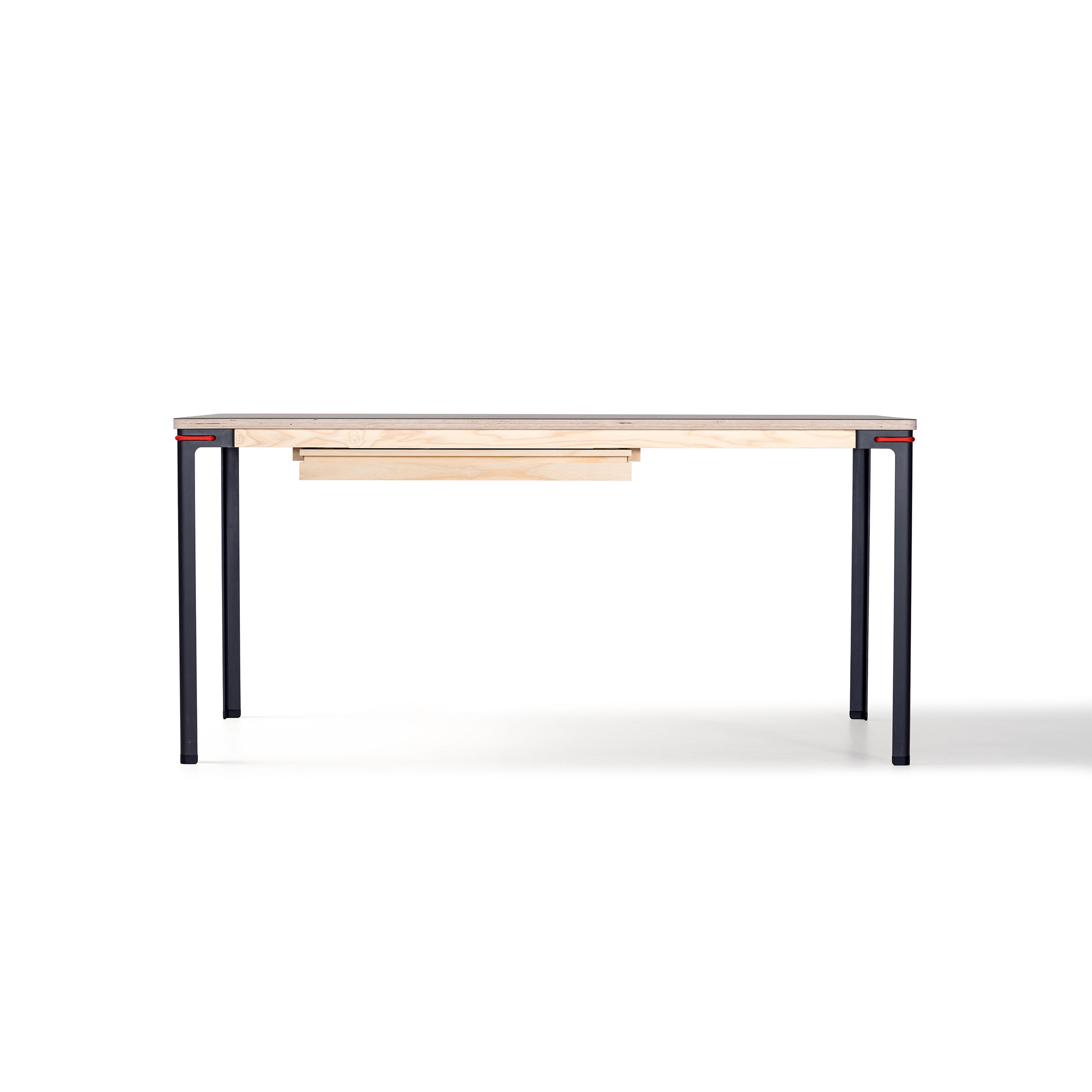 Introducing the Seiltänzer Table by Moormann, a minimalist desk featuring a light wood tabletop and sleek steel legs. Its modular design includes a slim integrated drawer, offering discrete storage. This modern piece highlights simplicity and functionality.