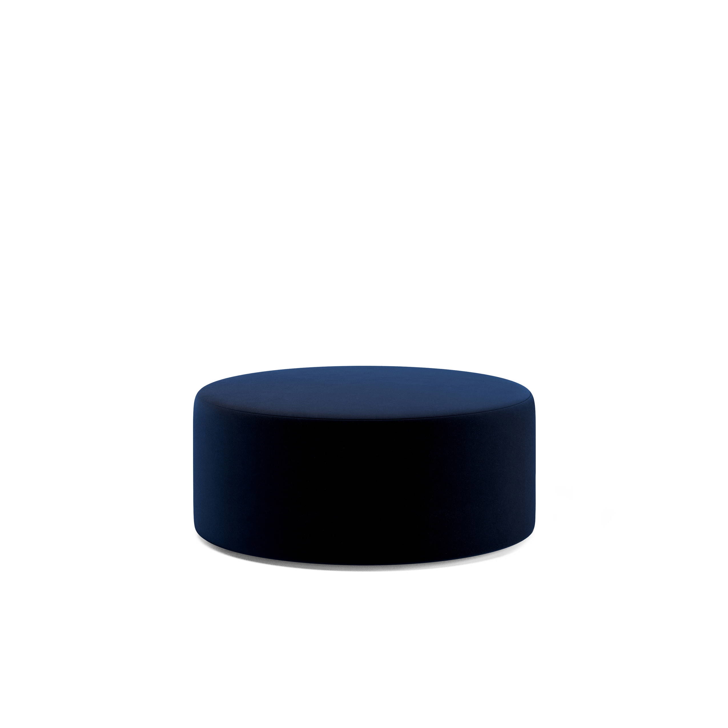 The Weber Pouf from Objekte unserer Tage, a blue circular ottoman crafted using geometric shapes, stands elegantly against a plain white background.