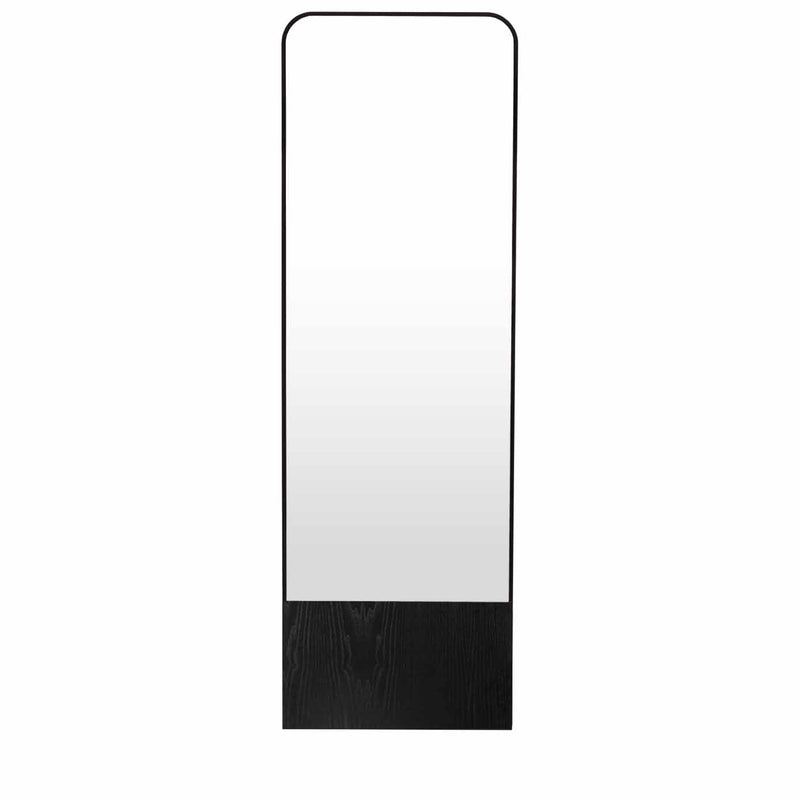The Friedrich Mirror by Objekte unserer Tage is a minimalist, upright full-length mirror featuring a sleek black frame, rounded top corners, and a contrasting solid black bottom panel. Its simple and modern design makes it ideal for contemporary living spaces.