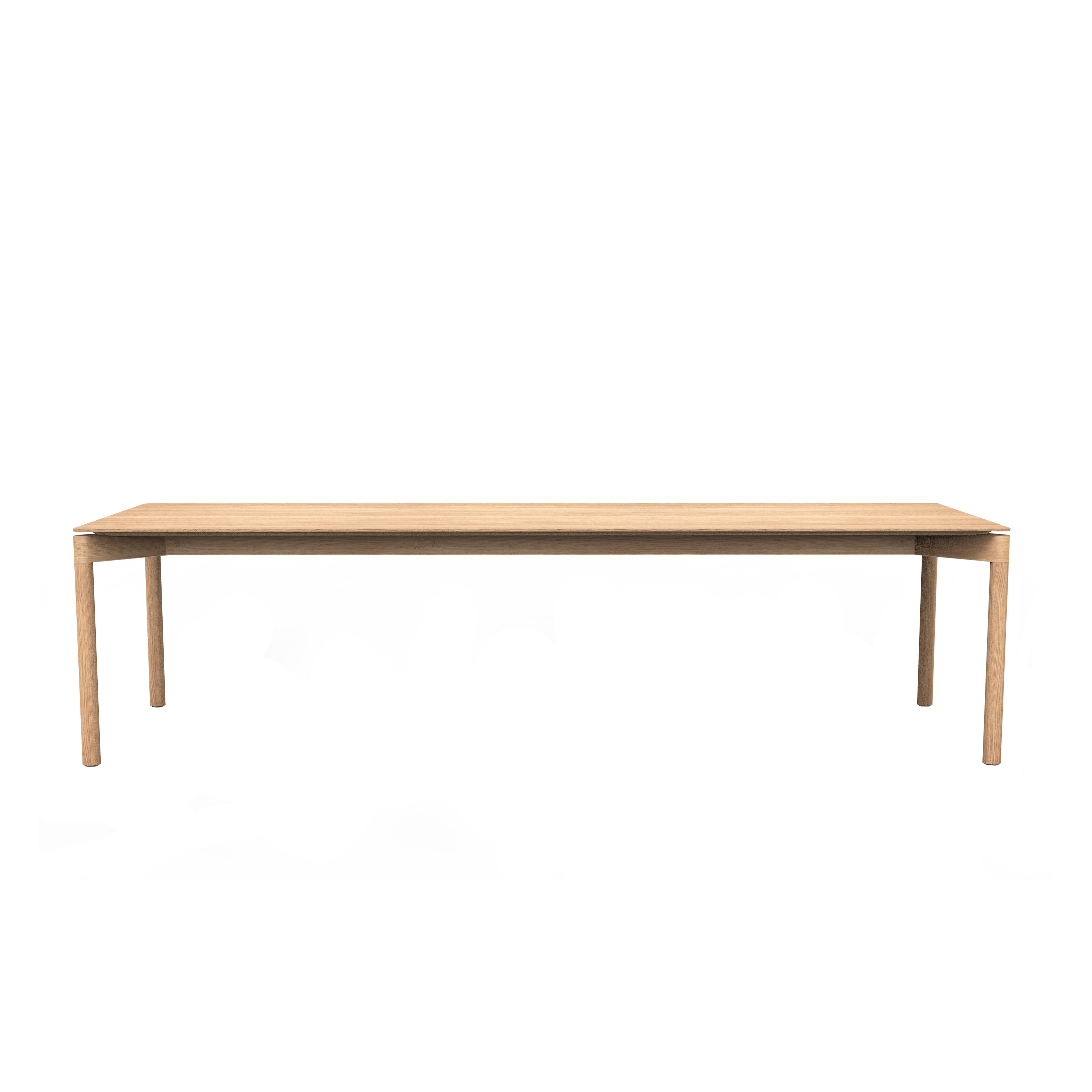 The Wedekind Table by Objekte unserer Tage is a long, rectangular wooden table with a minimalist design, crafted from sustainable oak wood. It features straight legs and a smooth surface, with its light tone elegantly standing out against a plain, dark backdrop.