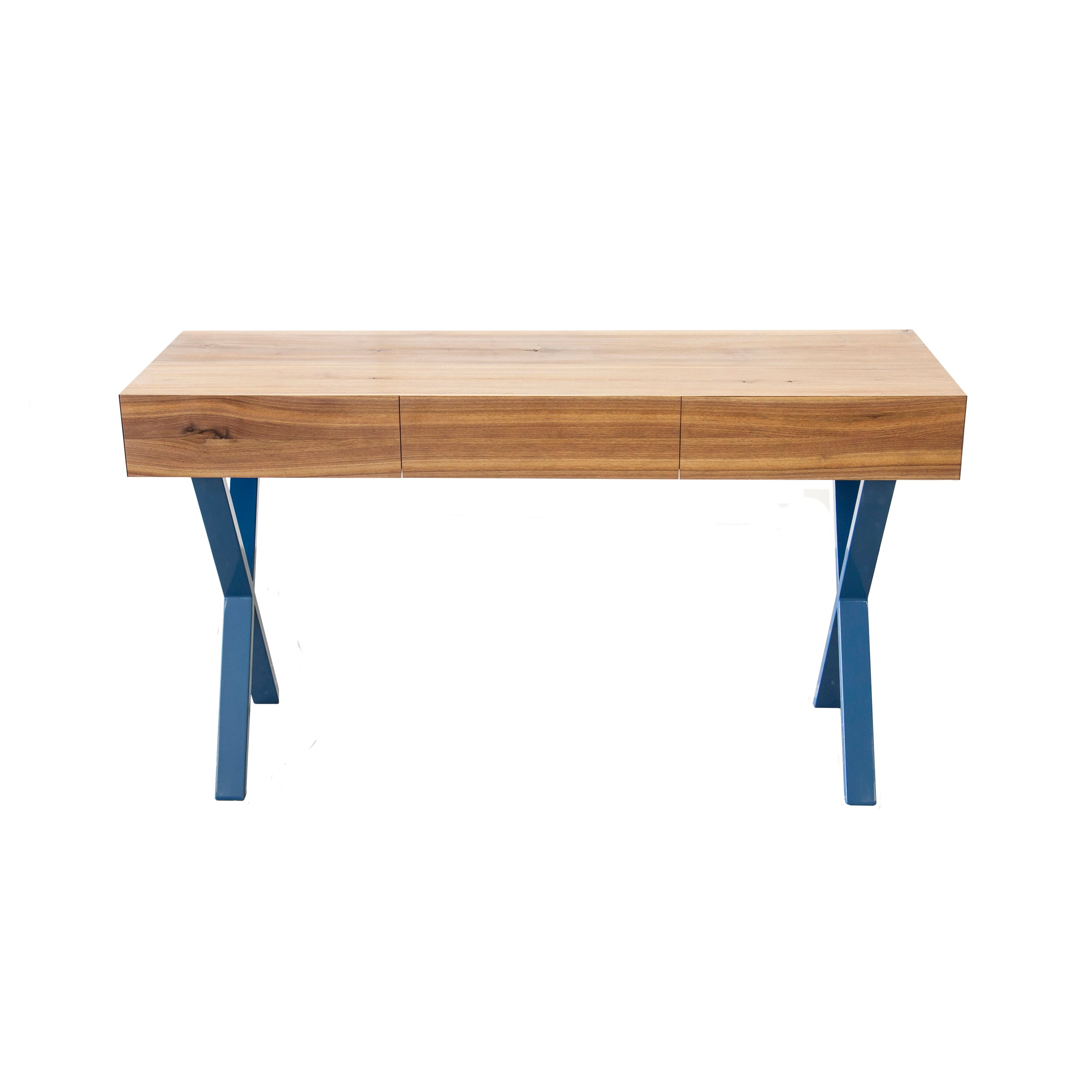The Bar X Console by One For Hundred features a light brown solid wood top with natural grain, three drawers, and blue metal legs in an X-shape, all set against a plain white background.