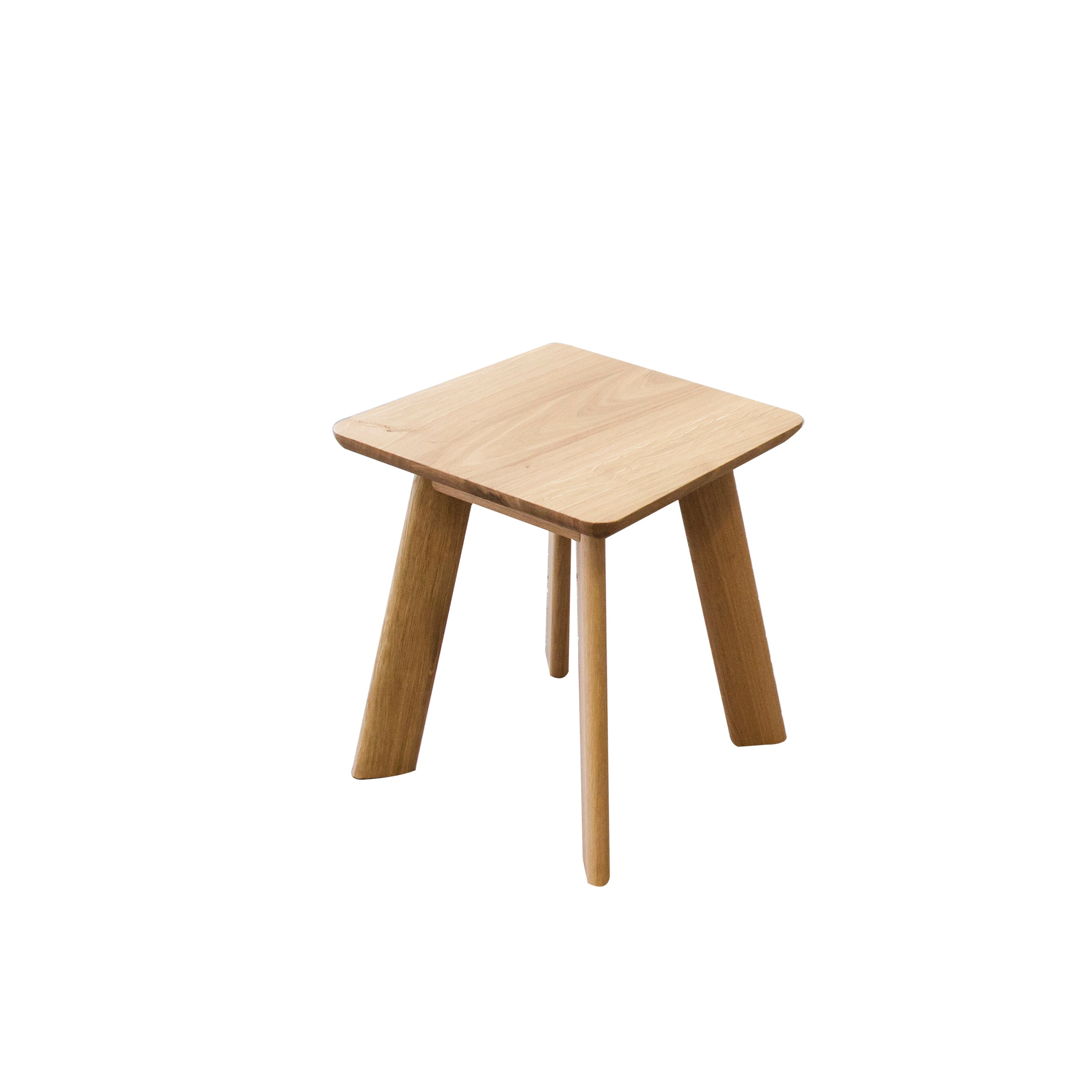 Part of One For Hundreds YOGI Stool collection, this minimalist design features a square top and three round legs in solid wood with a light finish. It’s versatile for custom sizes and is showcased against a plain white background.