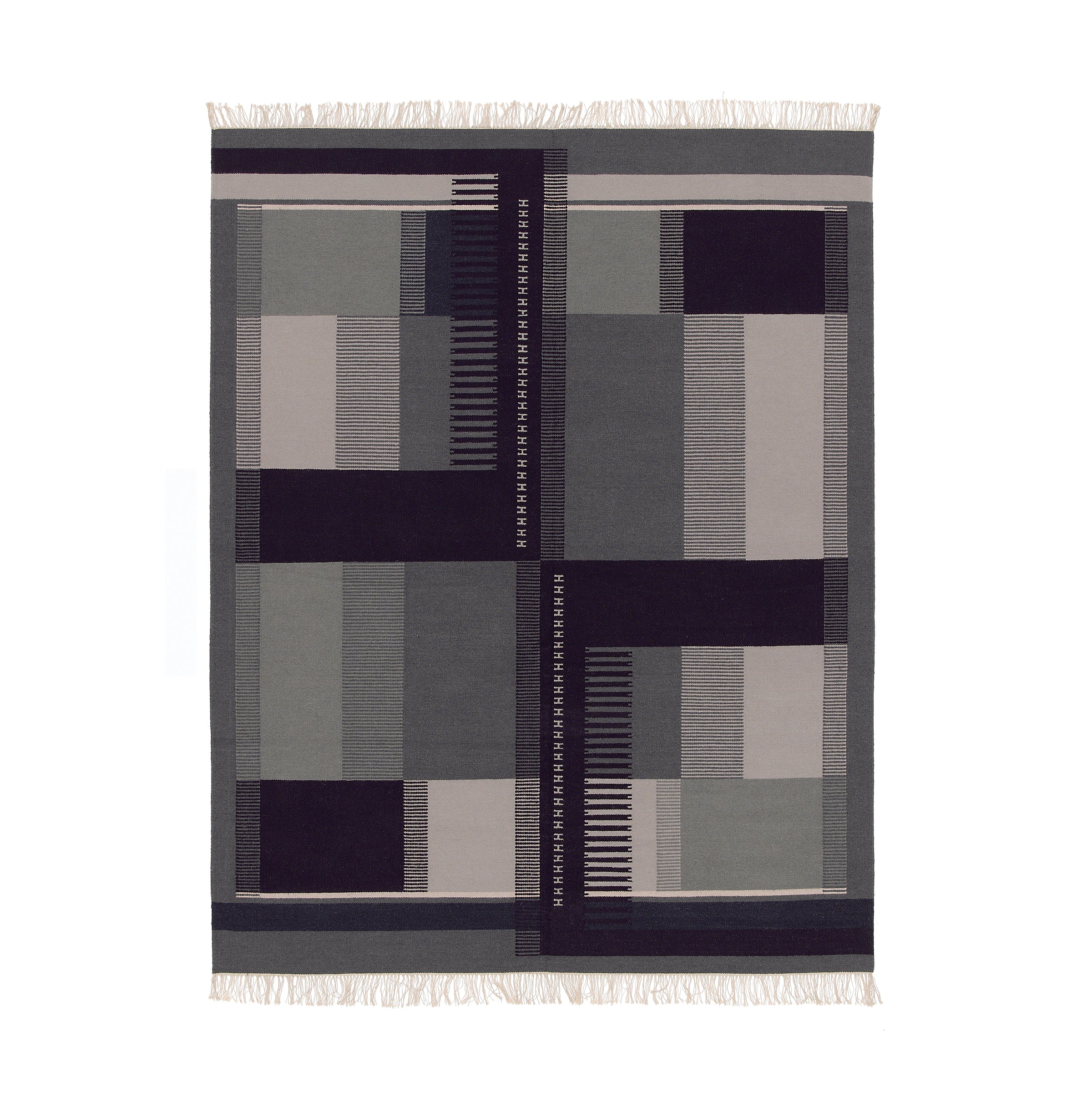 The RH02 Kilim Zet from E15, inspired by Richard Herres designs, features a geometric pattern of rectangles and stripes in gray, black, and beige. Made from hand-spun sheep wool, it is finished with fringed edges on the shorter sides for authenticity.