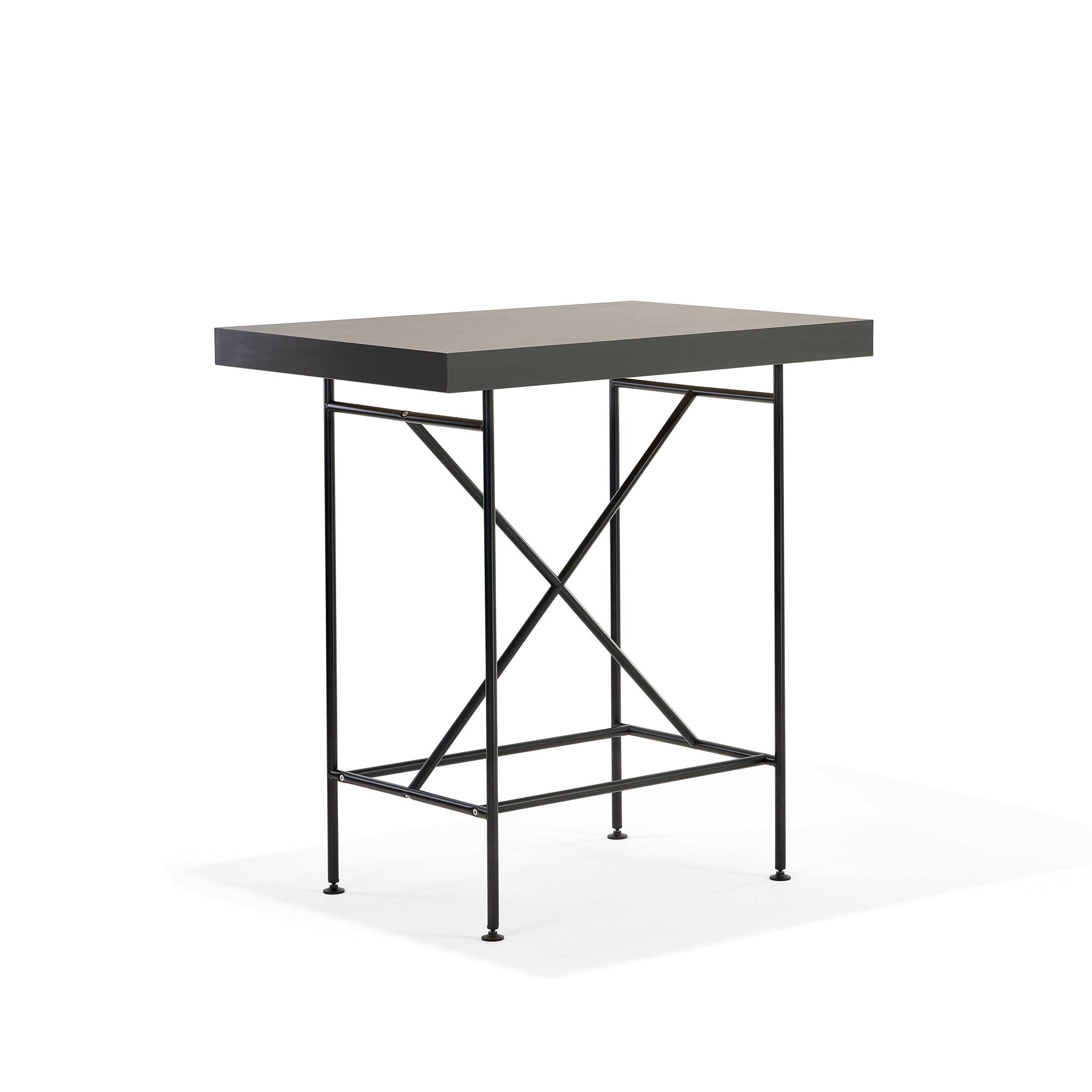 Meet the Milla High Table 1100 by Richard Lampert: a sleek, modern bar-height table featuring a rectangular dark wooden top and slender black metal legs with crossbars for stability. Its elegant design perfectly combines functionality with style against a plain white backdrop.