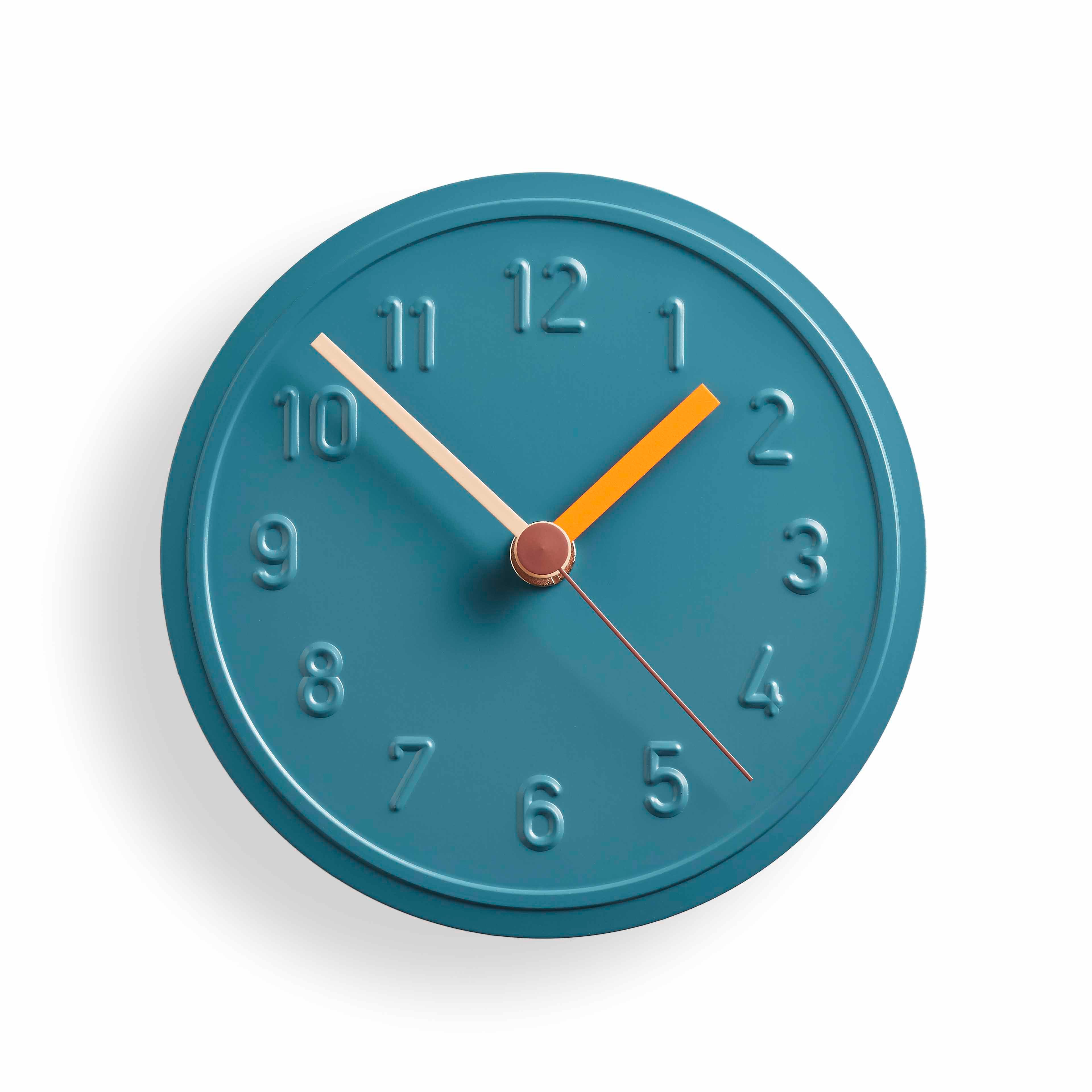 The Alu Alu Wallclock by Richard Lampert, designed by Jochen Gros, features a minimalistic teal aluminum design with embossed numbers and three hands: white hour, beige minute, and orange second. This quartz clock charmingly displays the time as 10:10.