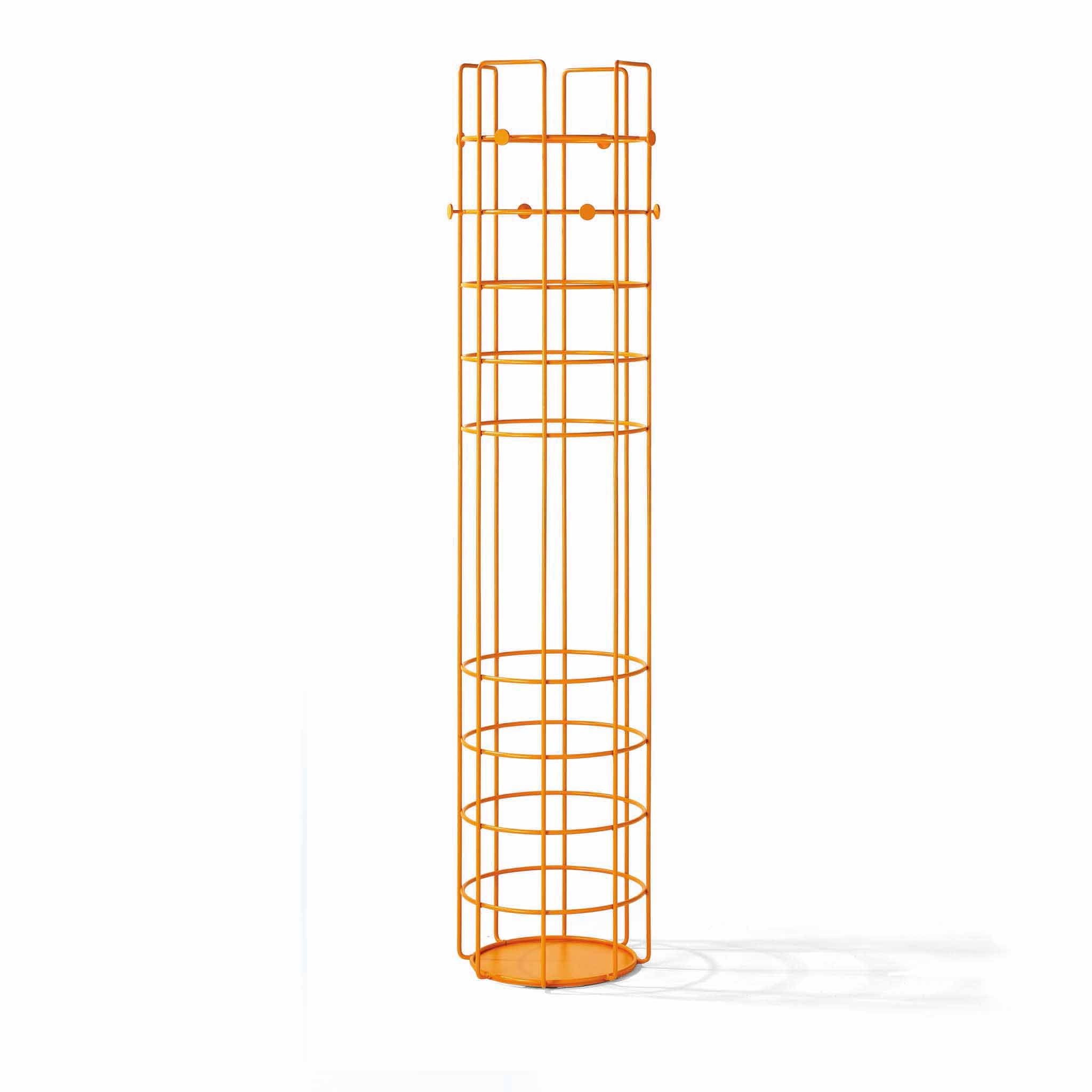 The Bazar Coat Stand by Richard Lampert is an orange, cylindrical metal wire design featuring a grid-like pattern and an extra circular shelf for storage. It stands on a solid base for stability and casts a faint shadow to the right.