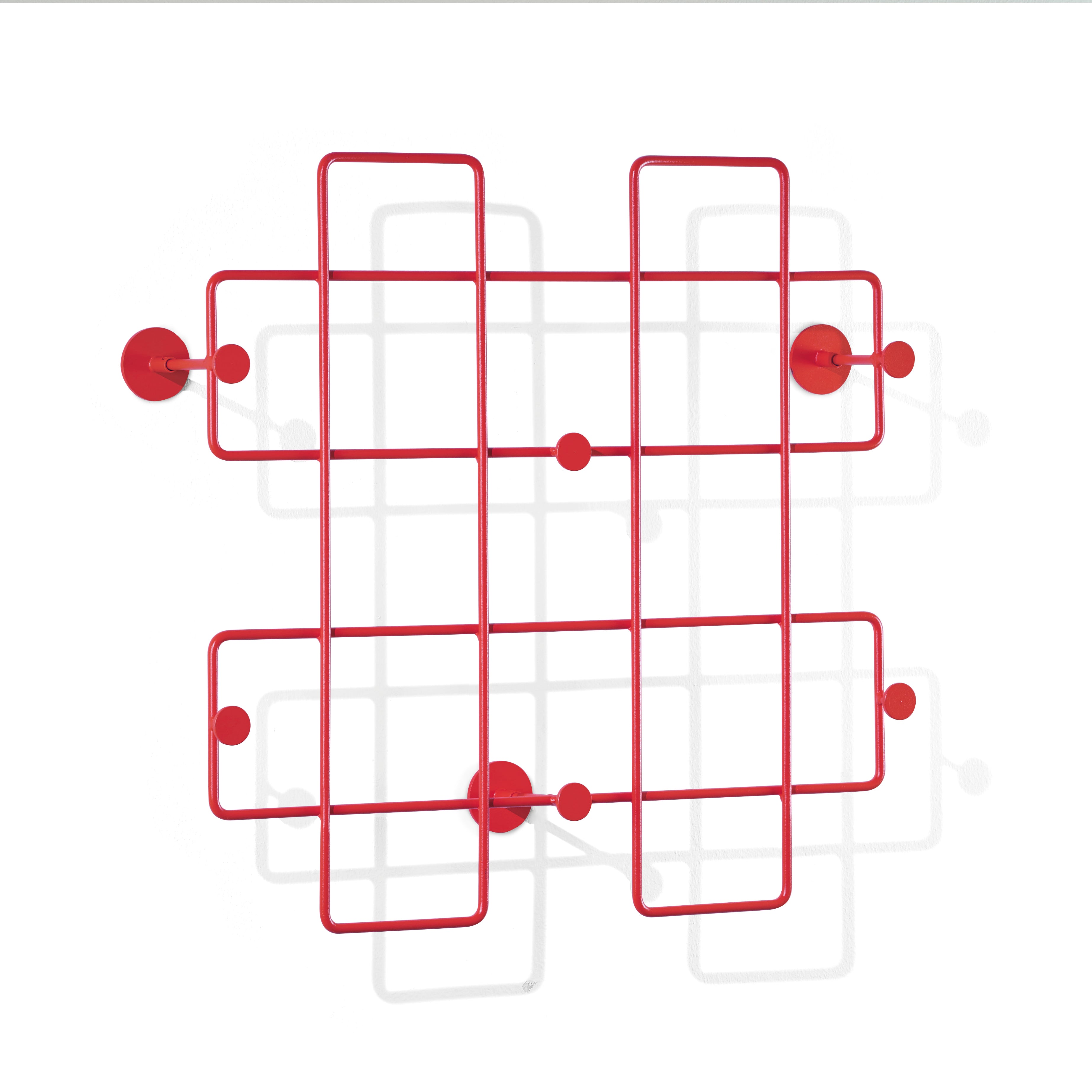The Bazar Coat Rack by Richard Lampert is a modern, red wall-mounted coat rack crafted from powder-coated steel. It features a geometric grid design with intersecting lines and circular knobs against a white background, ideal for stylish home organization.