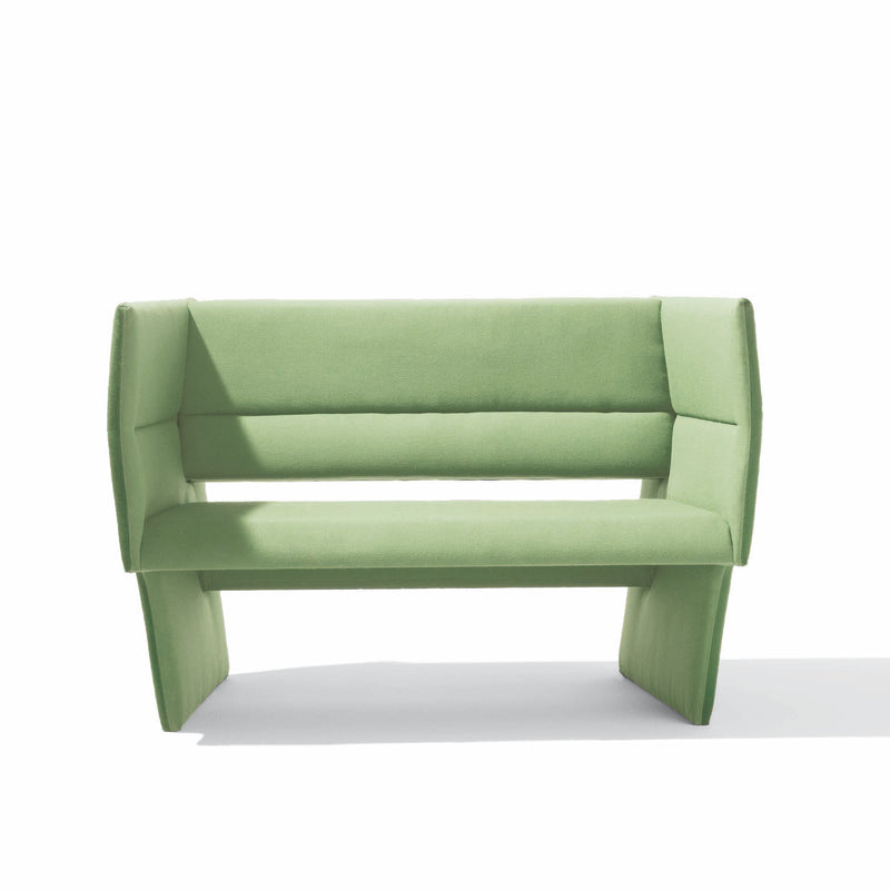 The Cup Sofa by Richard Lampert, a modern angular green bench with avant-garde design, features cushioned seating. Set against a white background, its geometric structure is highlighted and enhanced by high-end upholstery for added texture. Available for sale.