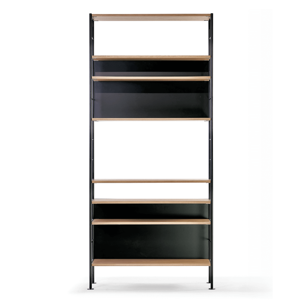 The DHS10 Shelf by Richard Lampert is a tall, six-tier bookshelf that exemplifies German industrial elegance. It features alternating wooden shelves and black panels on a sleek black metal frame, all set against a plain white background.