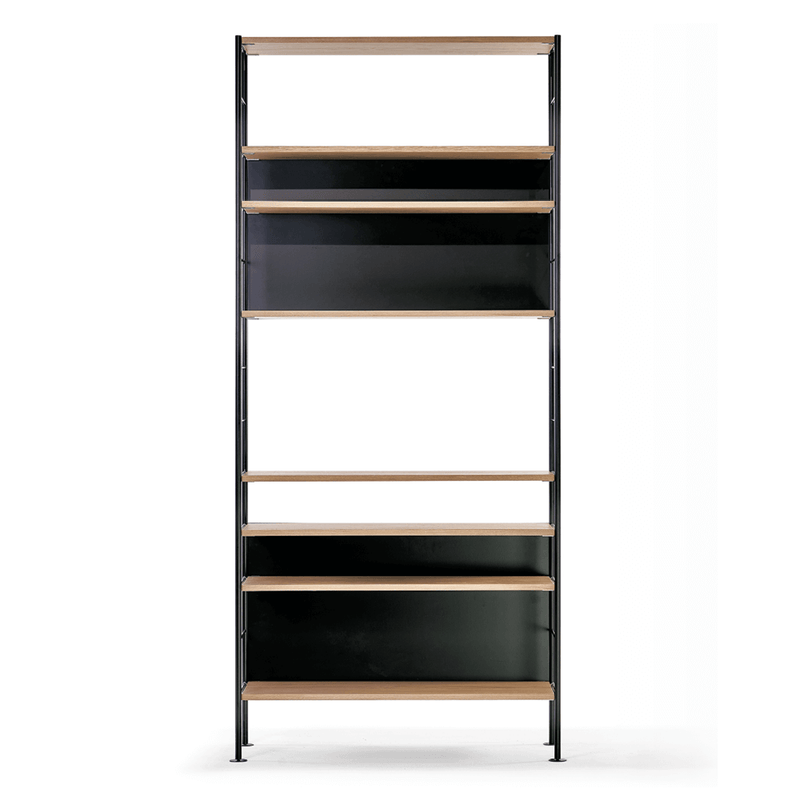 The DHS10 Shelf by Richard Lampert is a tall, six-tier bookshelf that exemplifies German industrial elegance. It features alternating wooden shelves and black panels on a sleek black metal frame, all set against a plain white background.