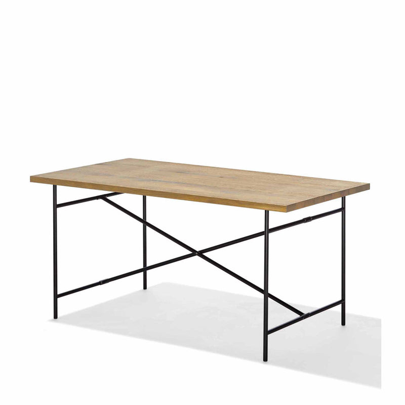 The Eiermann 2 Dining Table by Richard Lampert features a rectangular wooden top in light brown, black metal legs with an X-shaped support structure underneath, embodying a minimalist and industrial style reminiscent of Egon Eiermann, providing ergonomic comfort during meals.