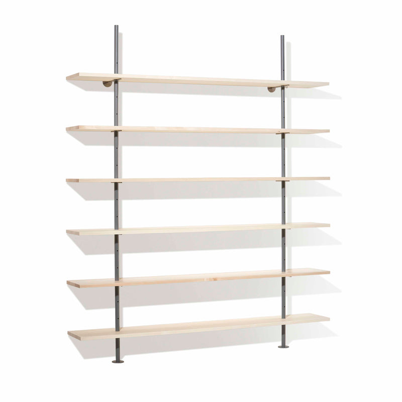The Eiermann Shelf by Richard Lampert is a minimalist wall-mounted unit with seven evenly spaced wooden shelves supported by vertical metal brackets against a white backdrop.