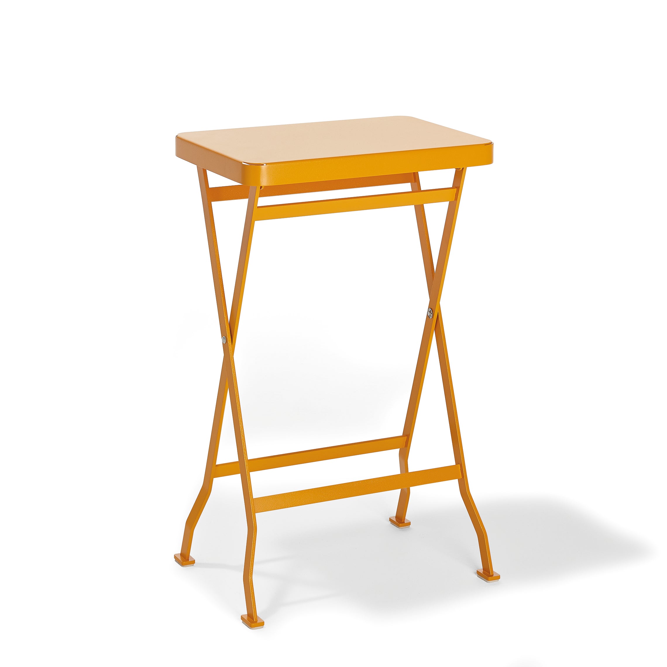 The Flip Side Table by Richard Lampert is a premium small, rectangular orange folding table with a smooth tabletop and X-shaped thin stainless steel legs, exuding elegance against a white backdrop.