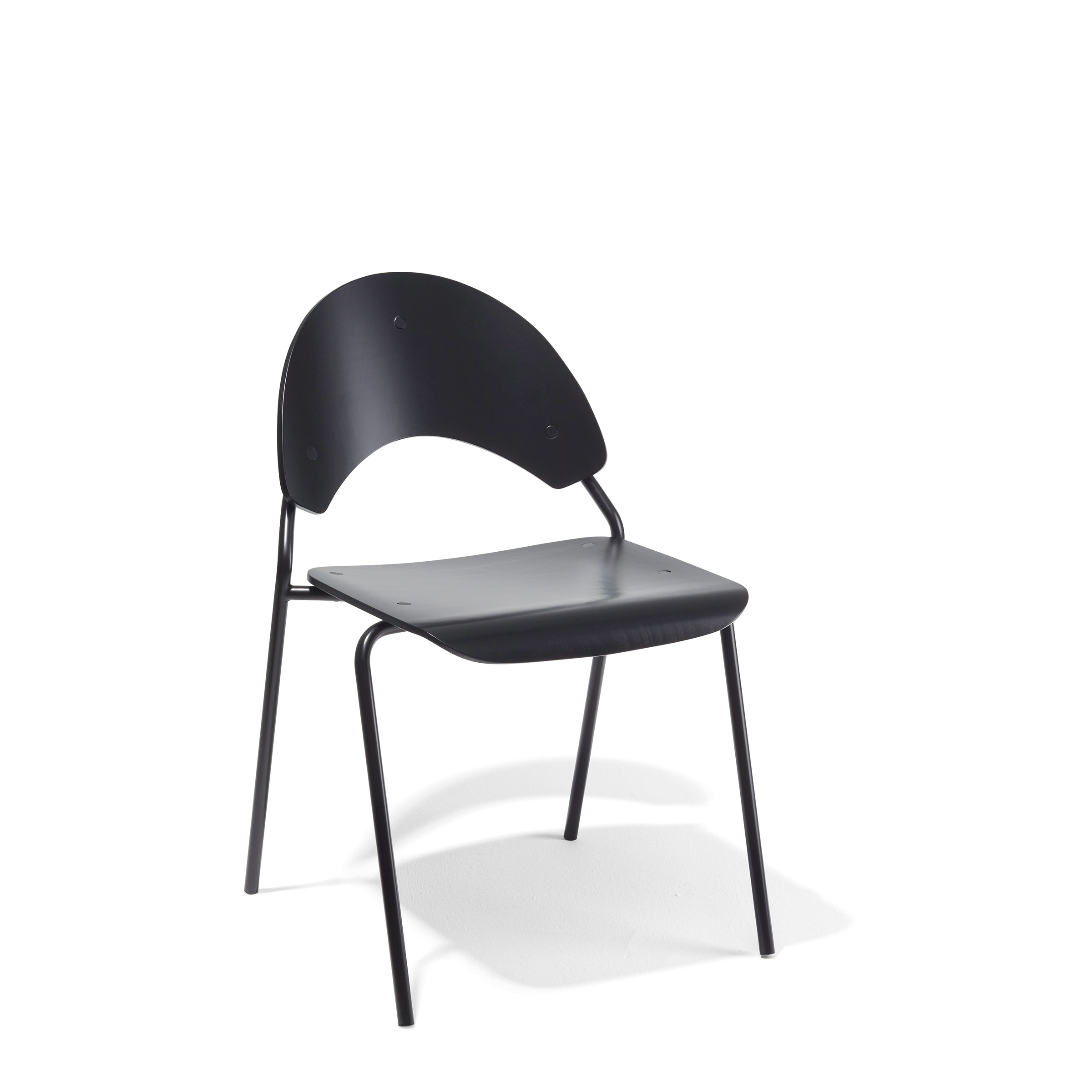 The Frog Chair by Richard Lampert, inspired by Herbert Hirches style, has a modern black design with a curved backrest and seat supported by slender black metal legs. This elegant and stackable chair is set against a plain white background.