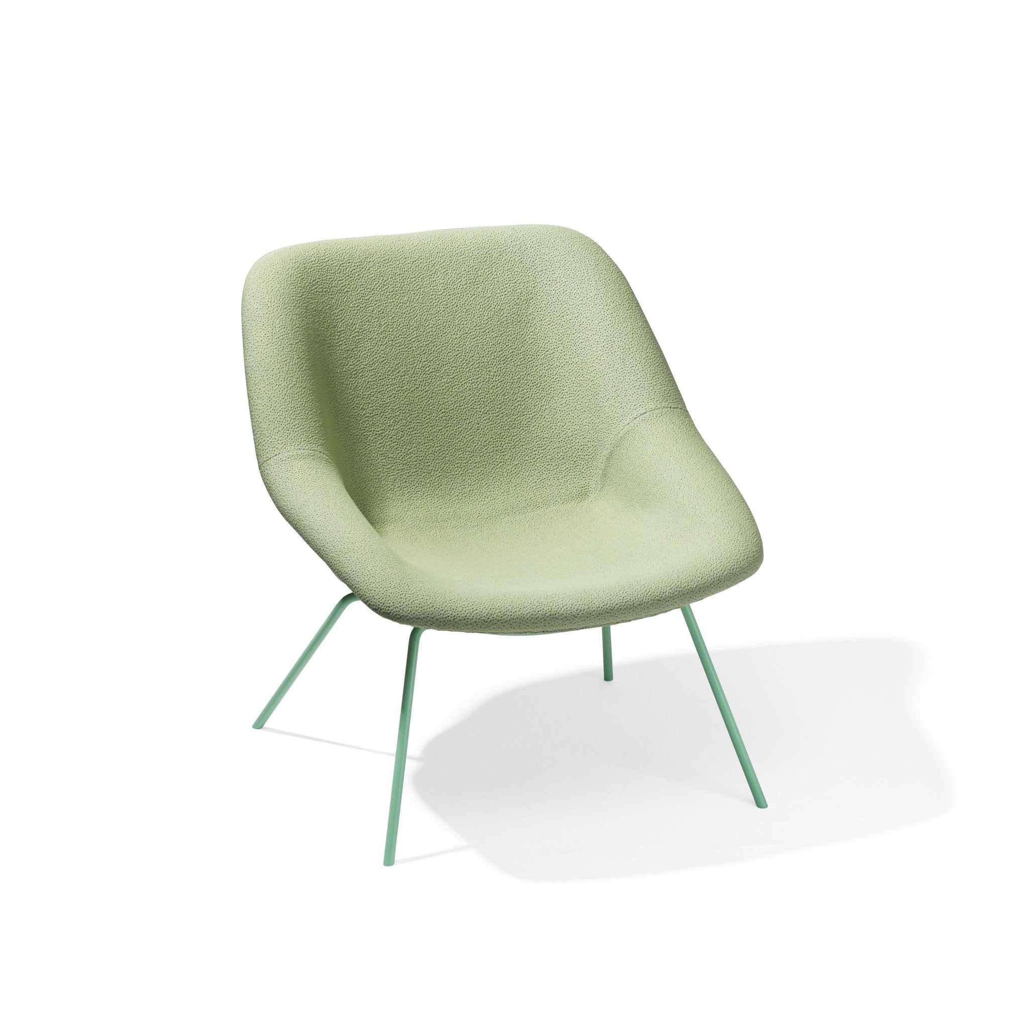The H 55 Lounge Chair by Richard Lampert is a modern, light green lounge chair with a curved, plush upholstered plastic seat and backrest. It features matching thin, angled tubular steel legs on a white background, giving it a sleek design reminiscent of a Herbert Hirche chair.