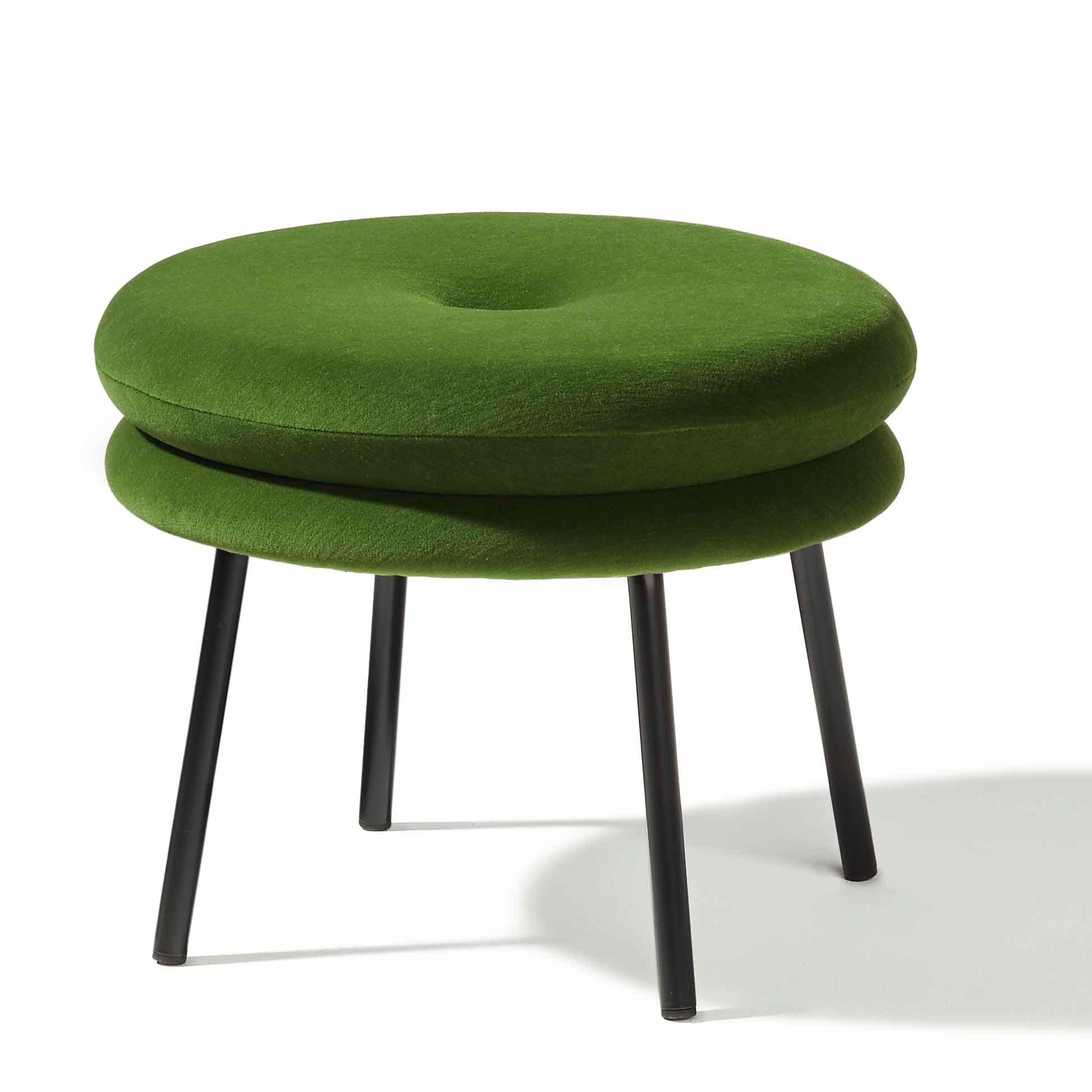 Presenting Richard Lamperts Little Tom Stool: a modern round design with a green cushioned seat and solid oak top, four slender black legs, and chrome-plated steel frame, all on a pristine white background.