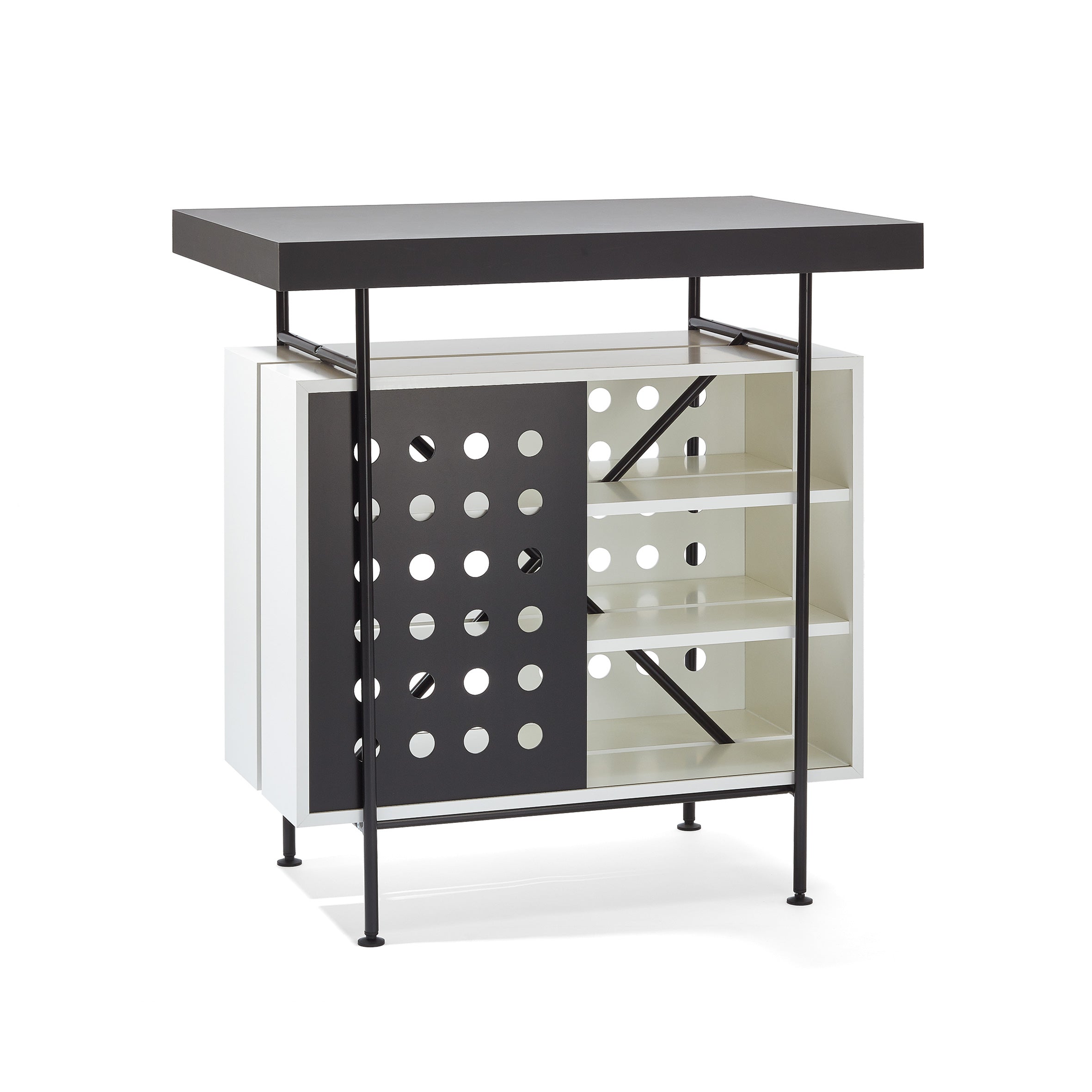 The Richard Lampert Milla Bistro Table showcases a sleek design with a black top and metal frame, featuring open shelving on the right and a black sliding panel with circular cutouts on the left for versatile storage.