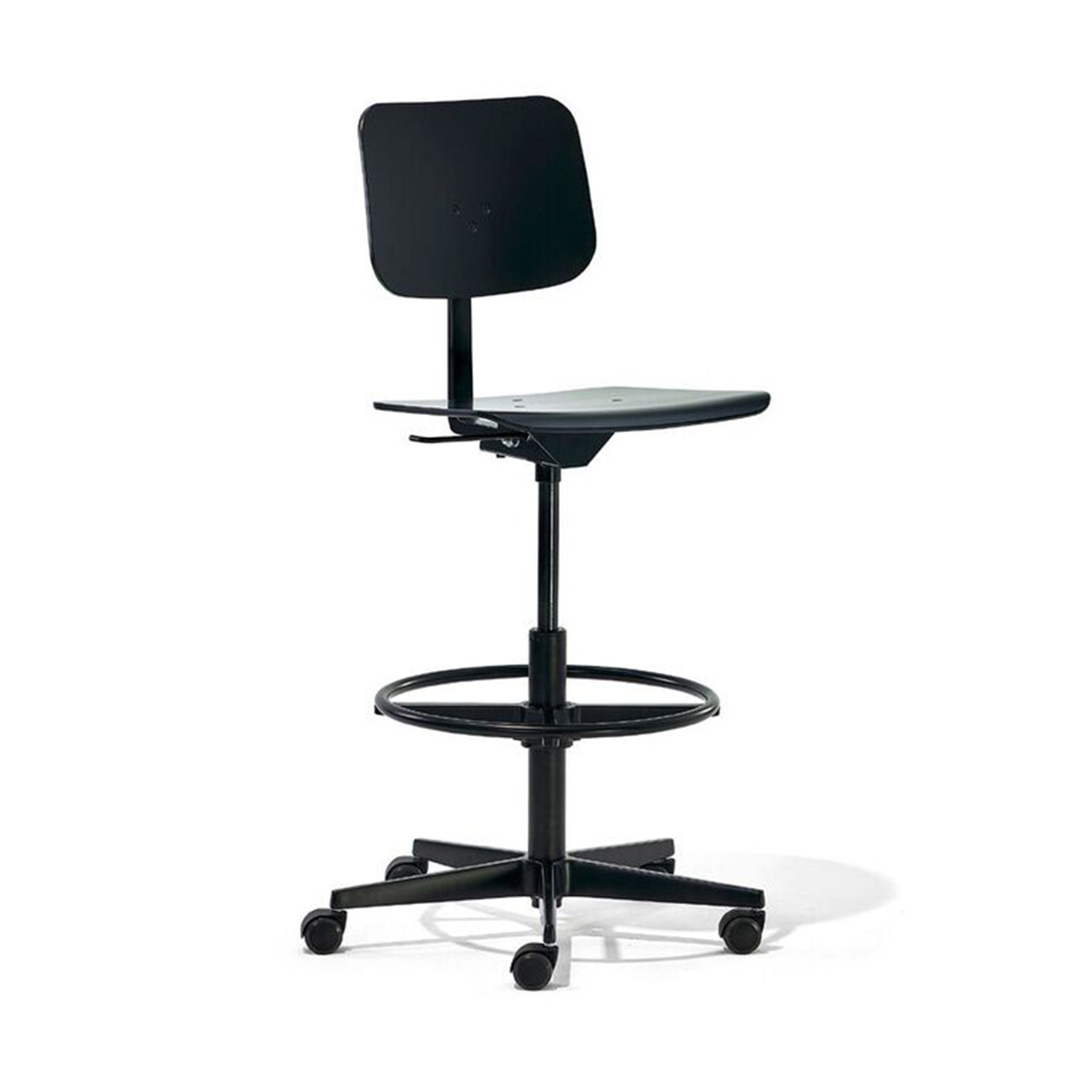The Mr. Square High Chair by Richard Lampert is a black adjustable drafting chair with a flat backrest and seat, sleek black metal frame, height adjustment, foot ring, and a cast aluminum swivel base with five caster wheels for easy mobility against a white background.